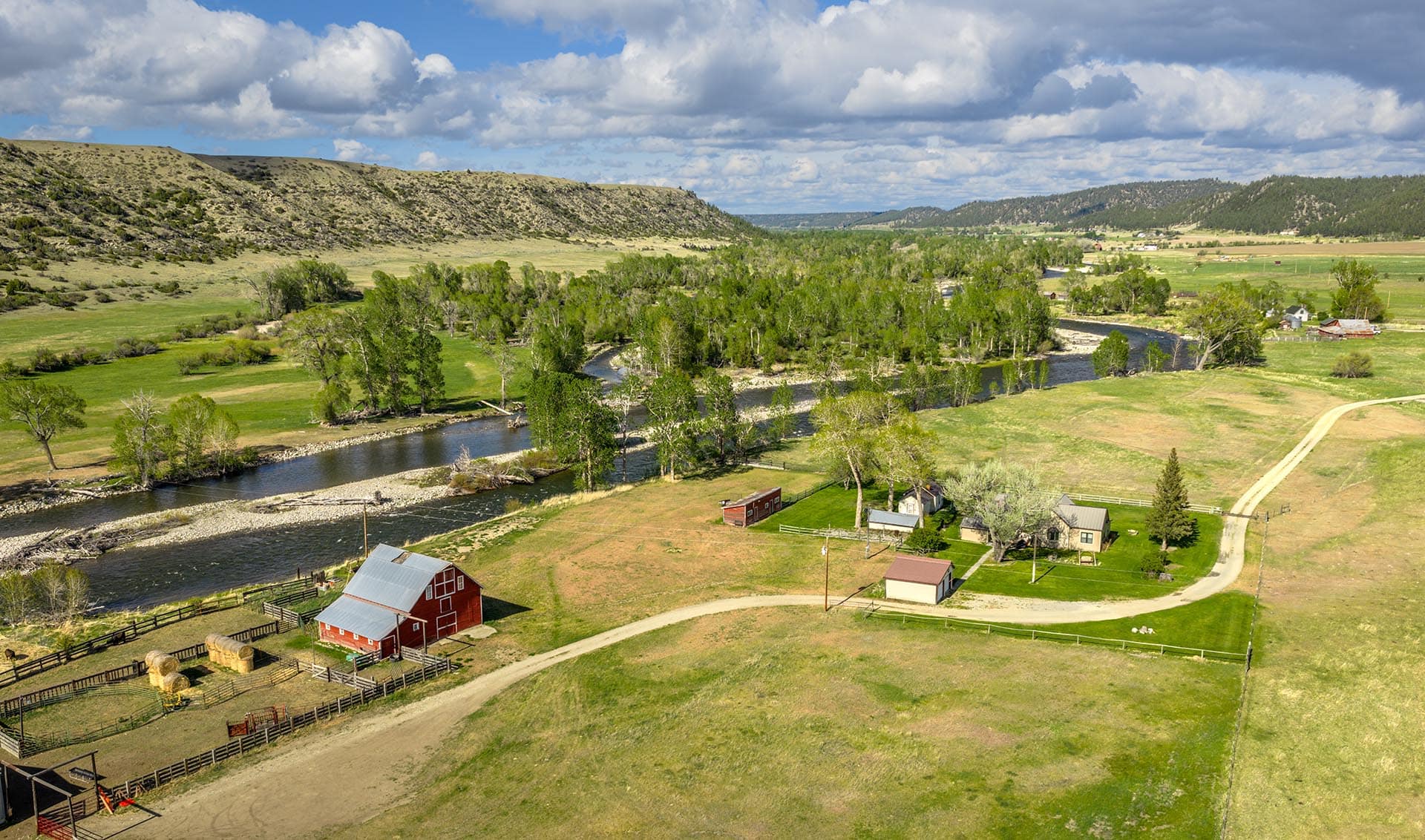 barn and riverfront homes land montana stillwater riffle ranch
