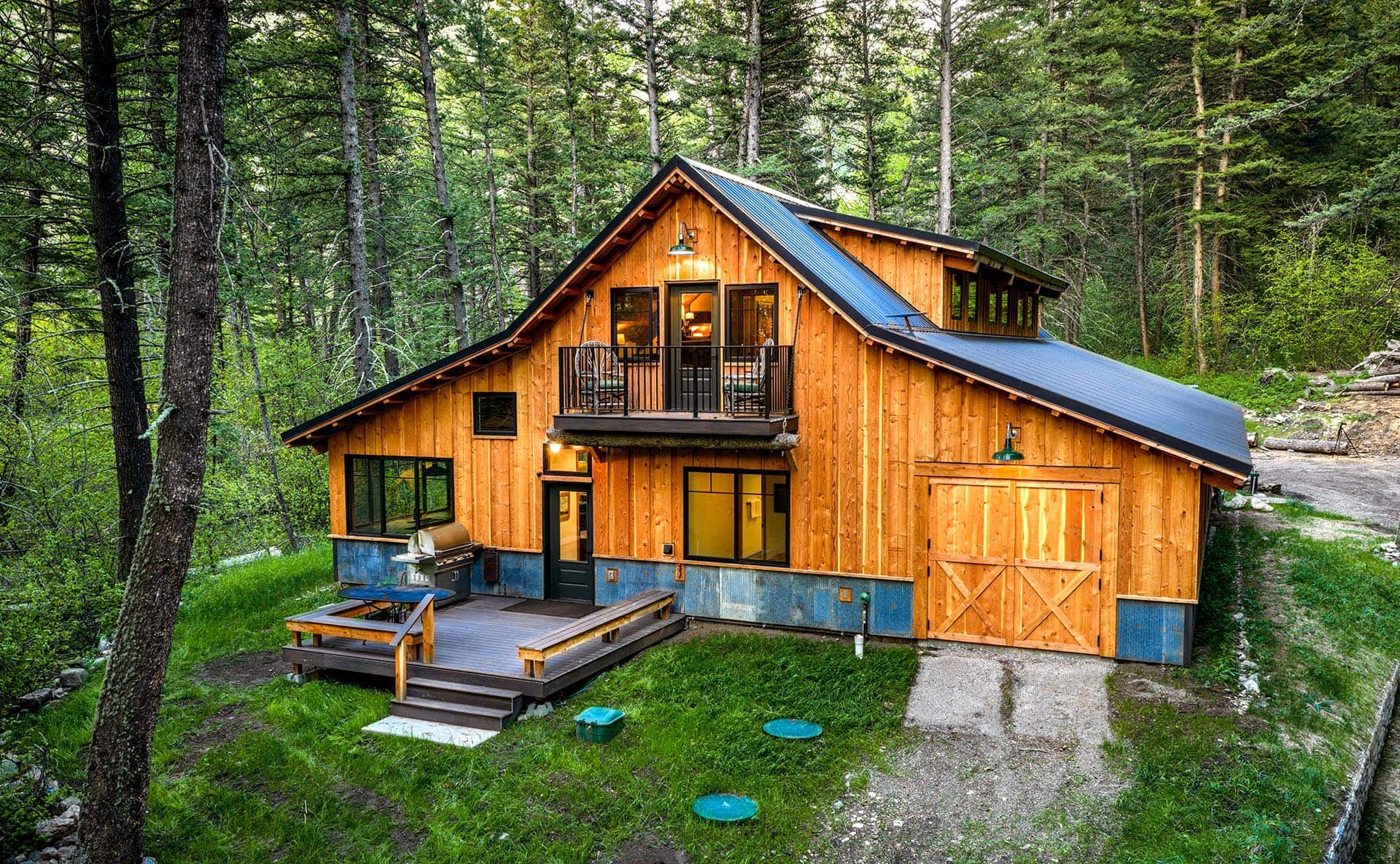 barn house in forest for sale montana bozeman creekside hideaway