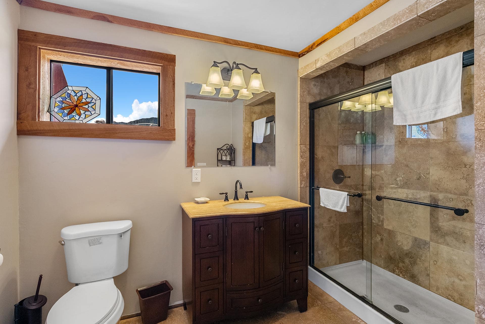 bathroom with stained glass window property for sale montana two rivers lodge