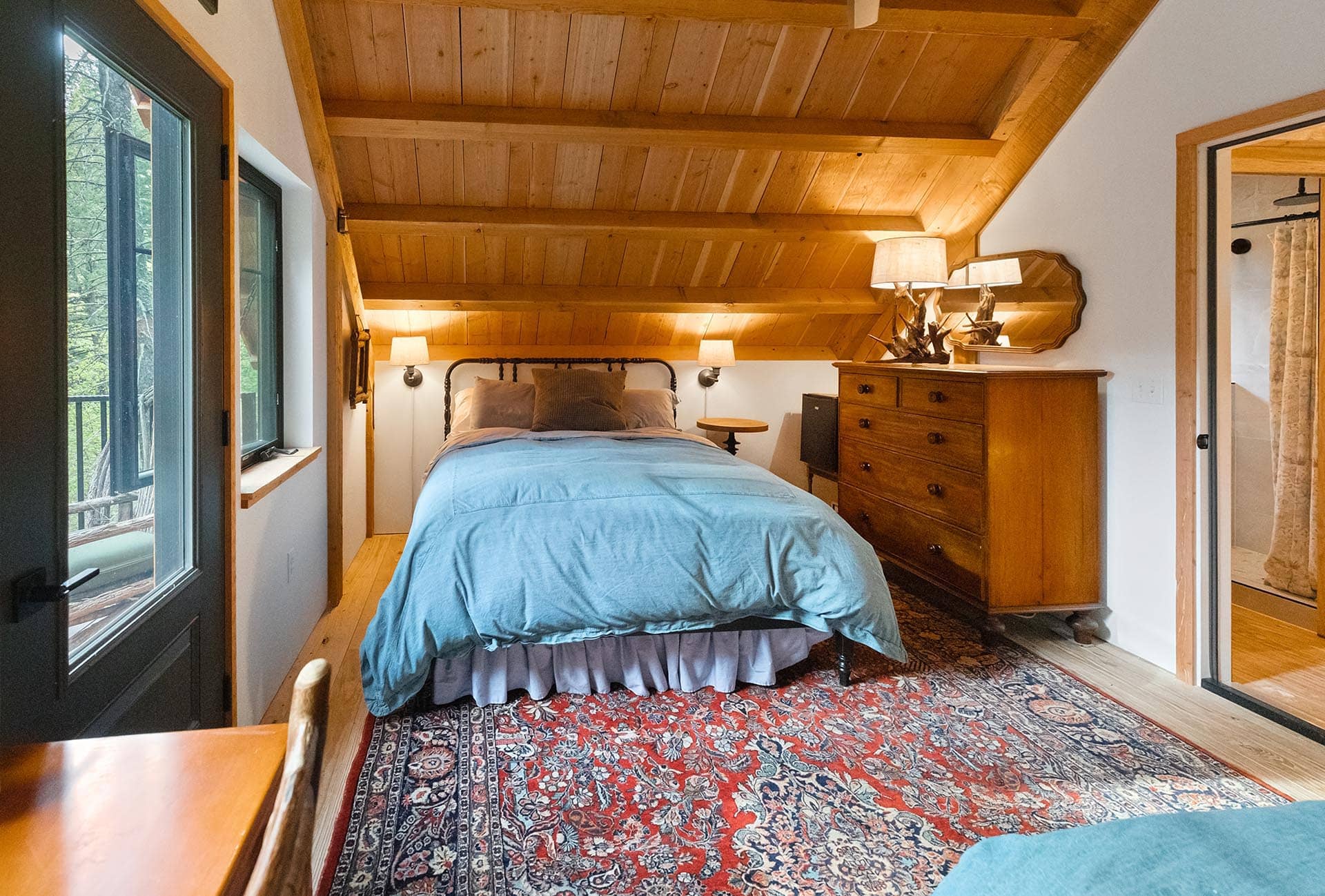 bedroom with wood plank ceiling for sale montana bozeman creekside hideaway