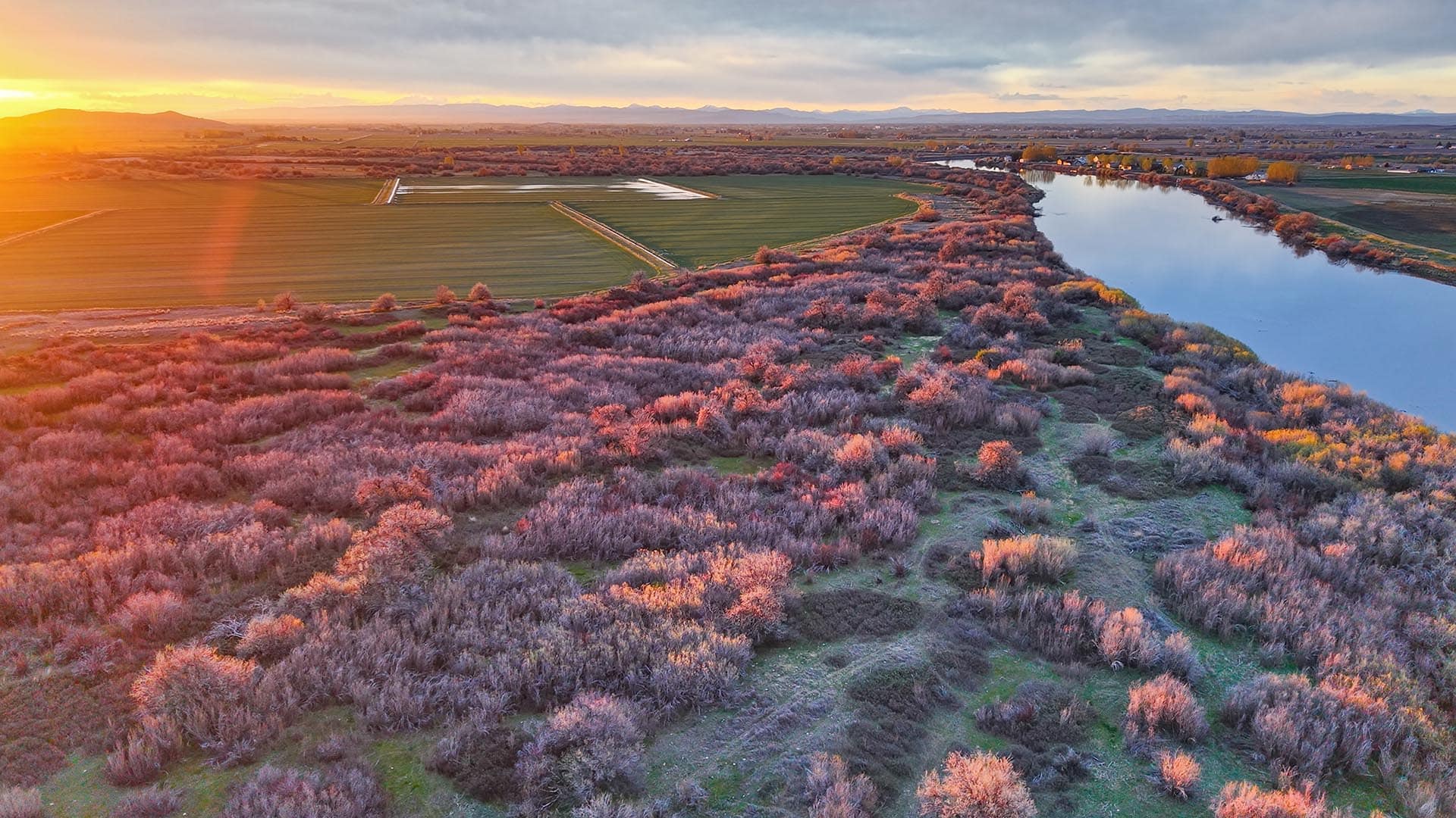 cultivated fields river frontage at sunset idaho oxbow crescent