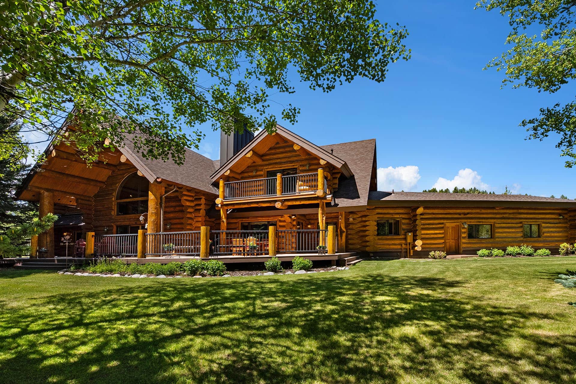 custom log house with balcony montana gallatin riverfront retreat in big sky