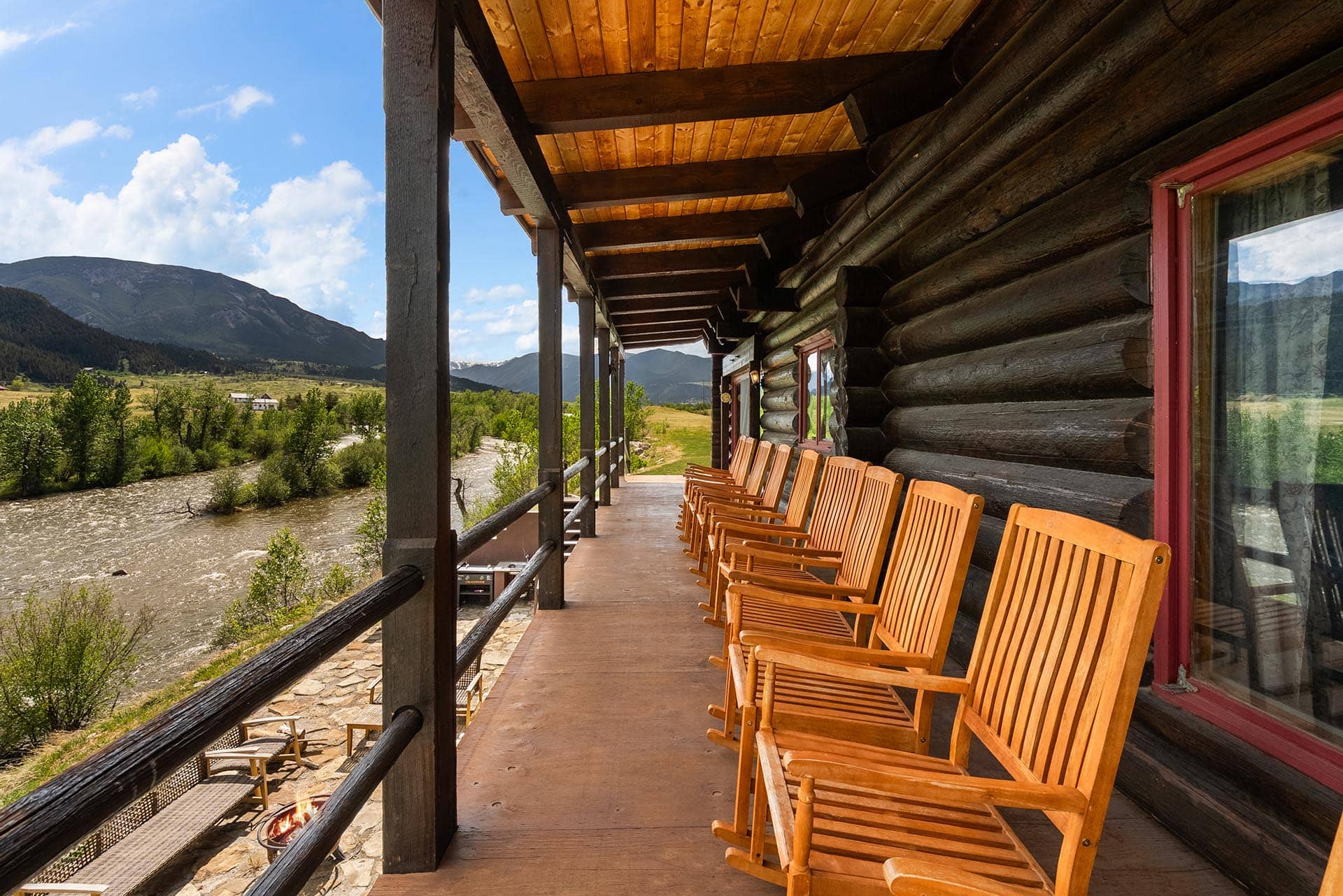 fly fishing property with log home porch and river views montana two rivers lodge