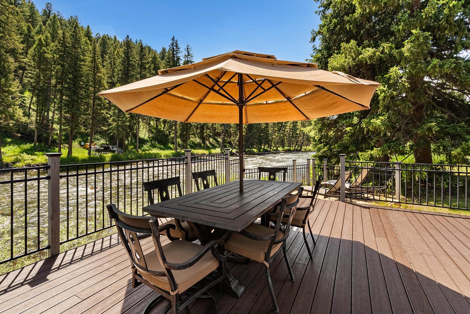 gallatin riverfront deck outdoor dining montana gallatin riverfront retreat in big sky
