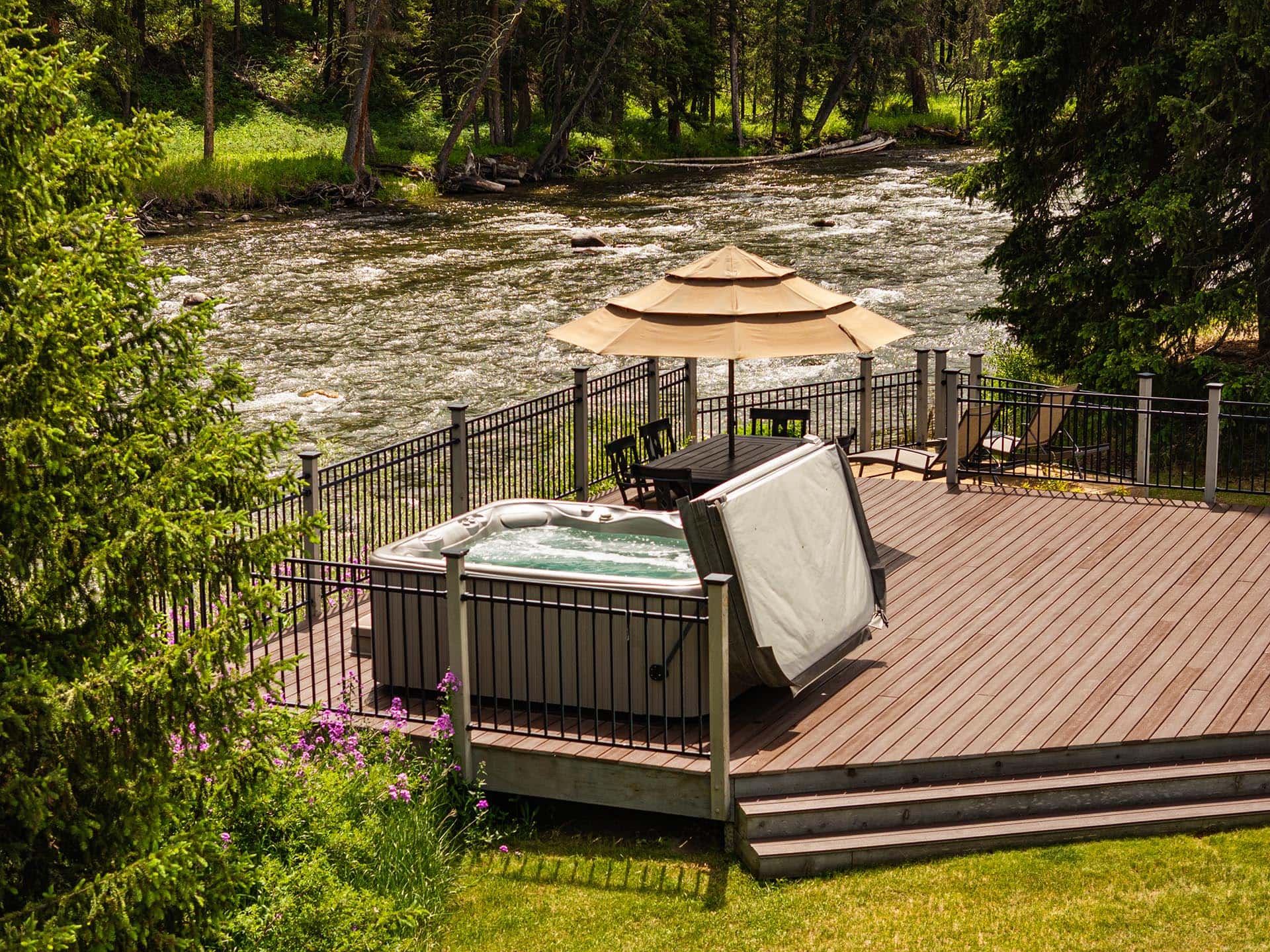hot tub deck river view land montana gallatin riverfront retreat in big sky