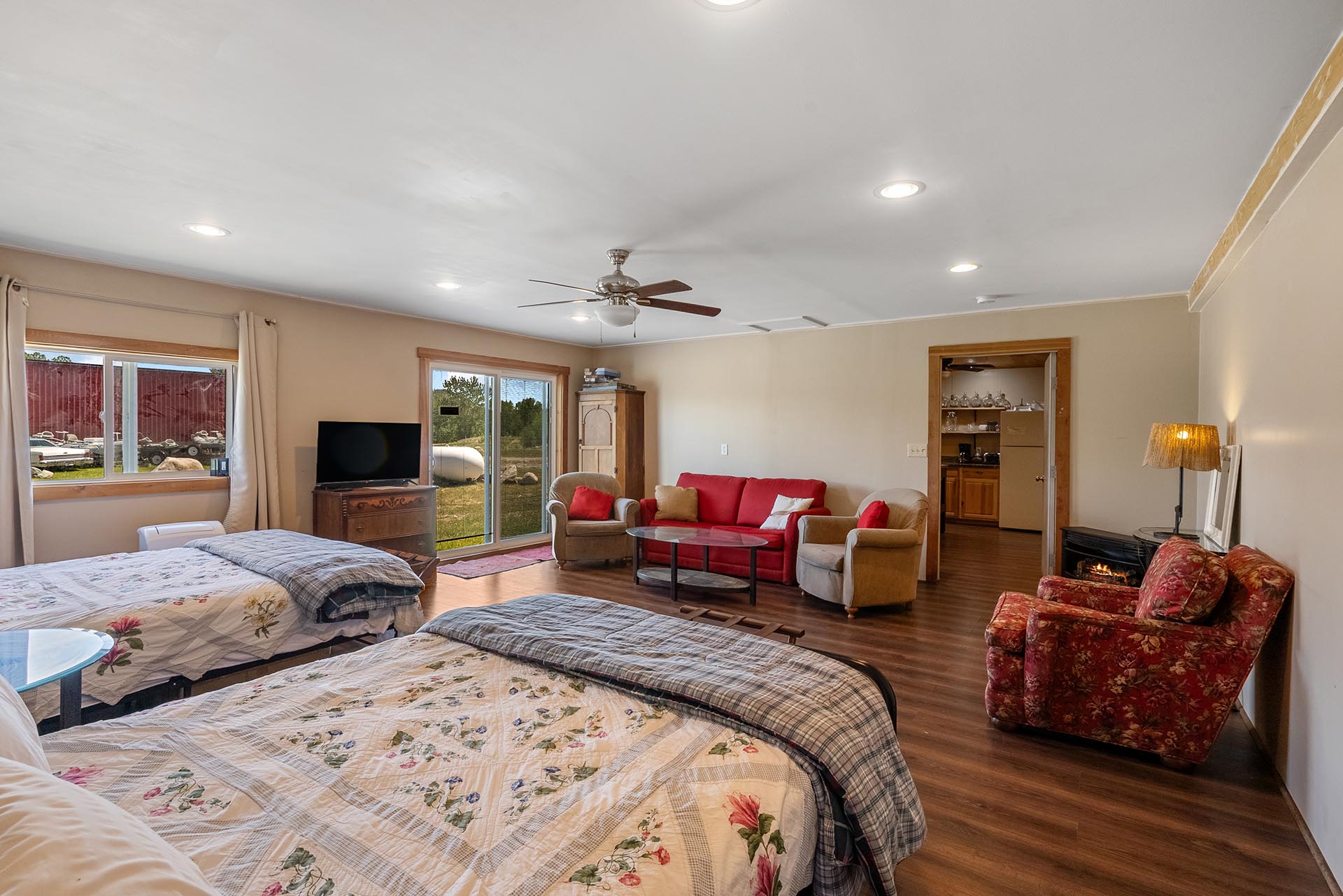 lodge guest room living area with wood stove montana two rivers lodge