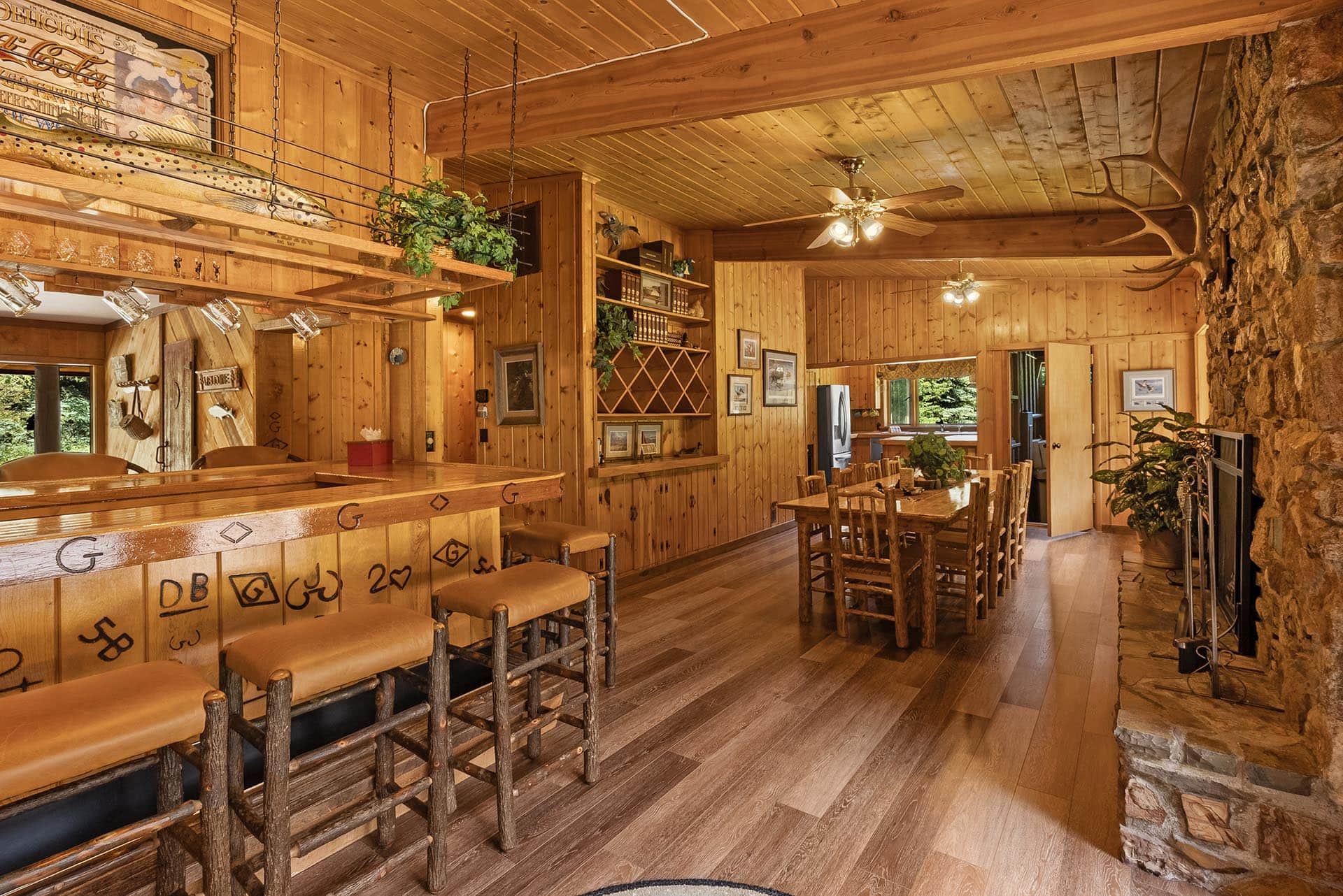 lodge style interior with bar and dining montana gallatin riverfront retreat in big sky
