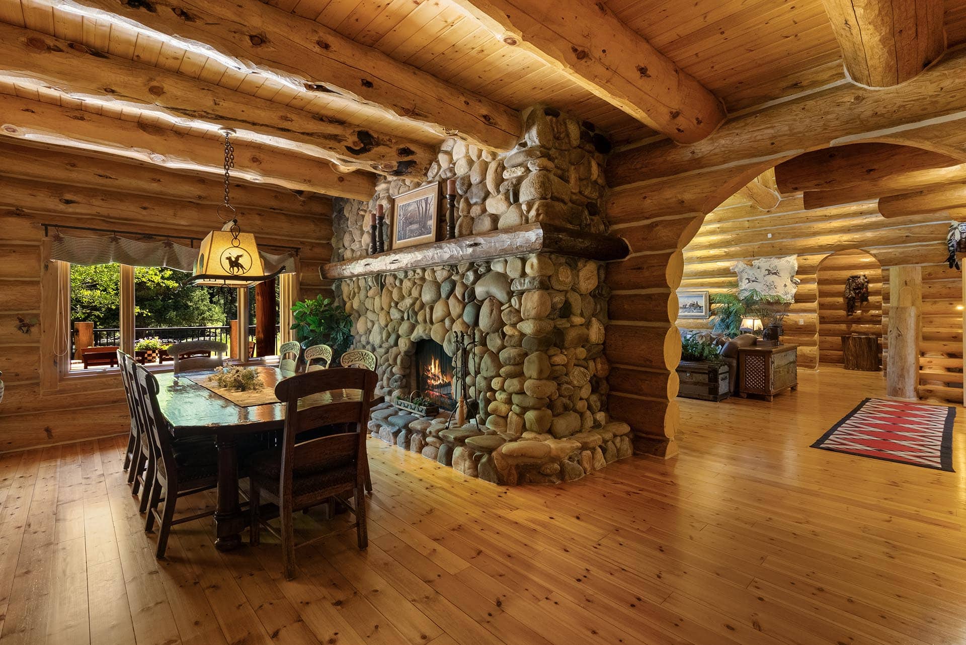 log cabin dining room montana gallatin riverfront retreat in big sky