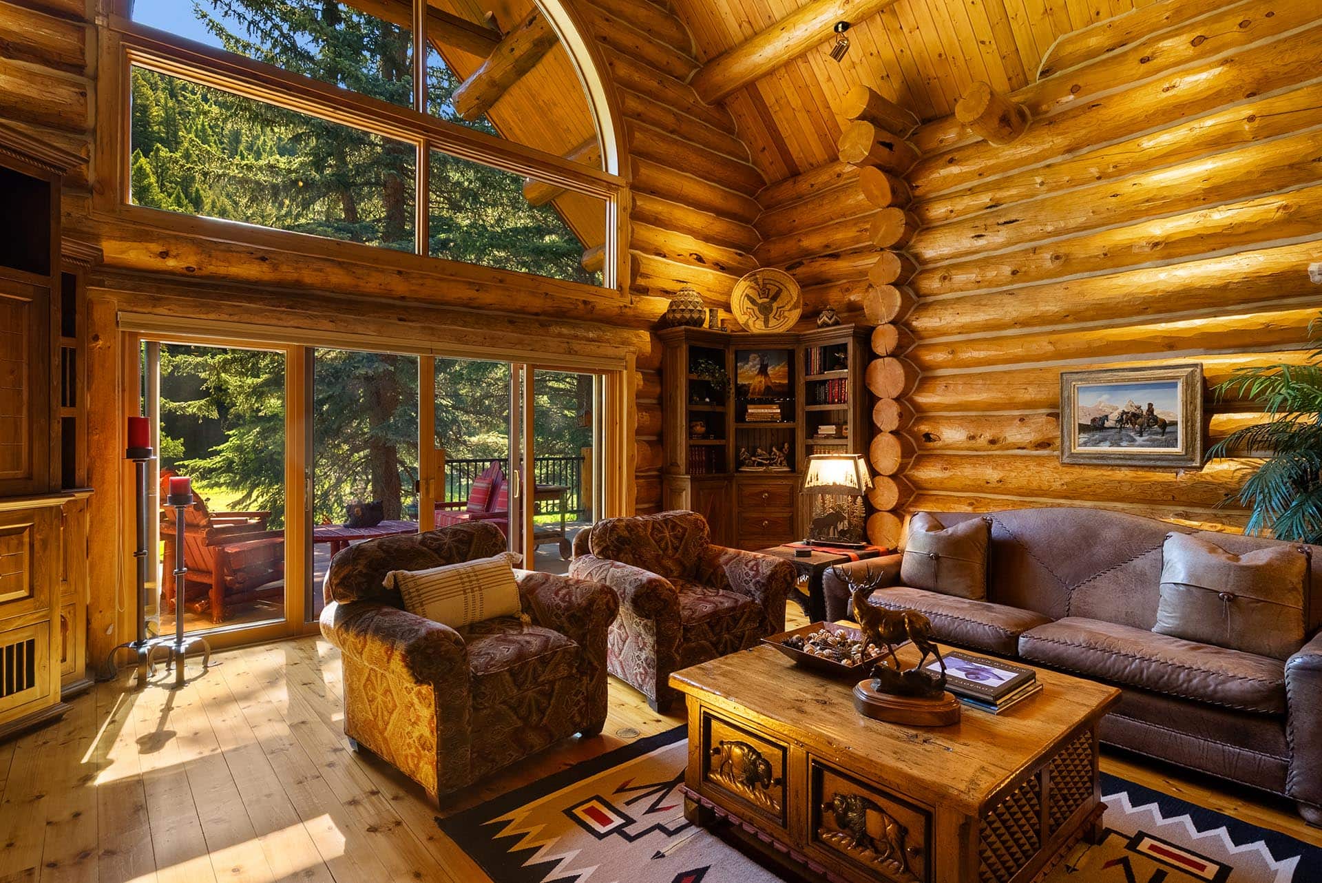 log home living room with view land montana gallatin riverfront retreat in big sky