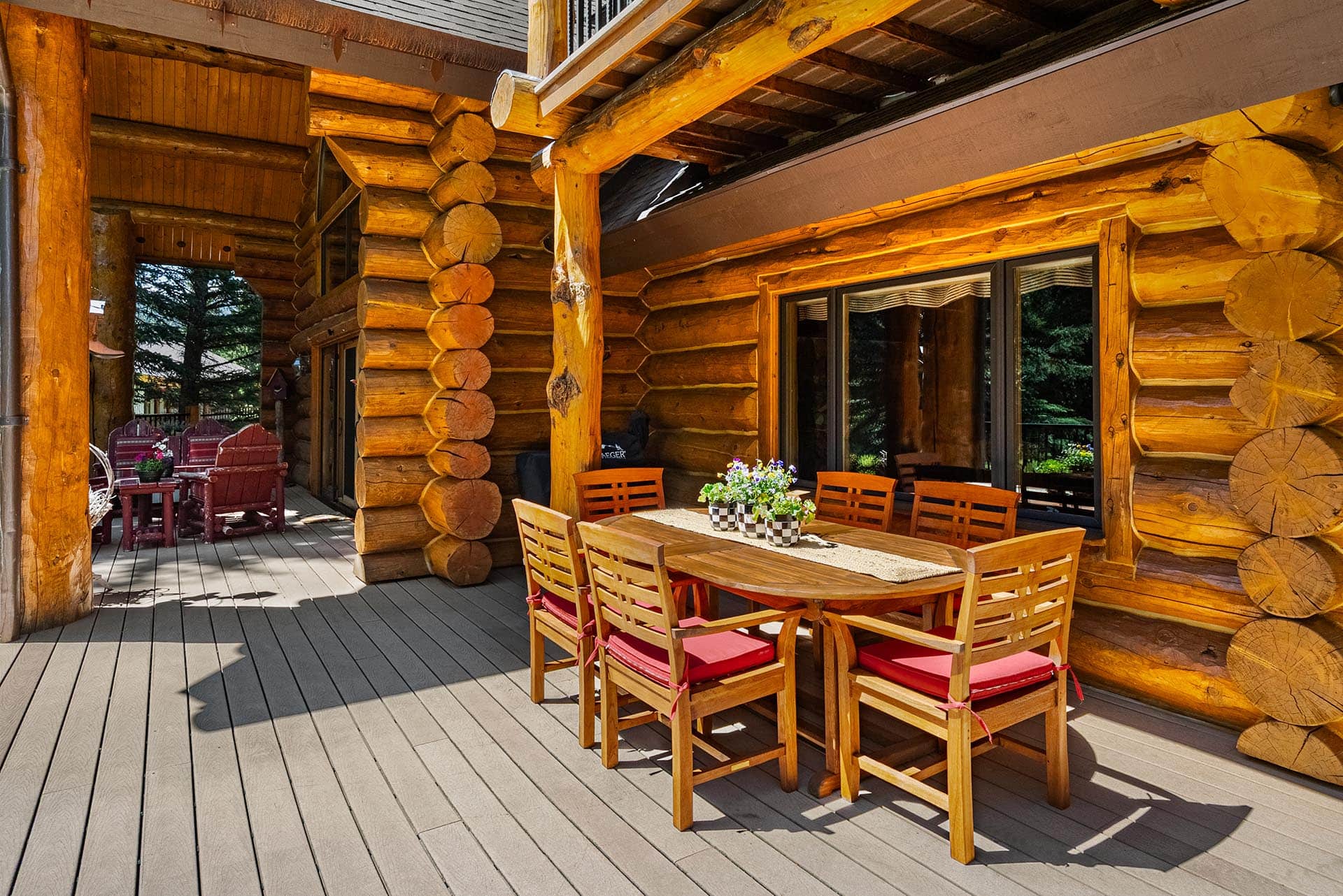 log home outdoor living area montana gallatin riverfront retreat in big sky