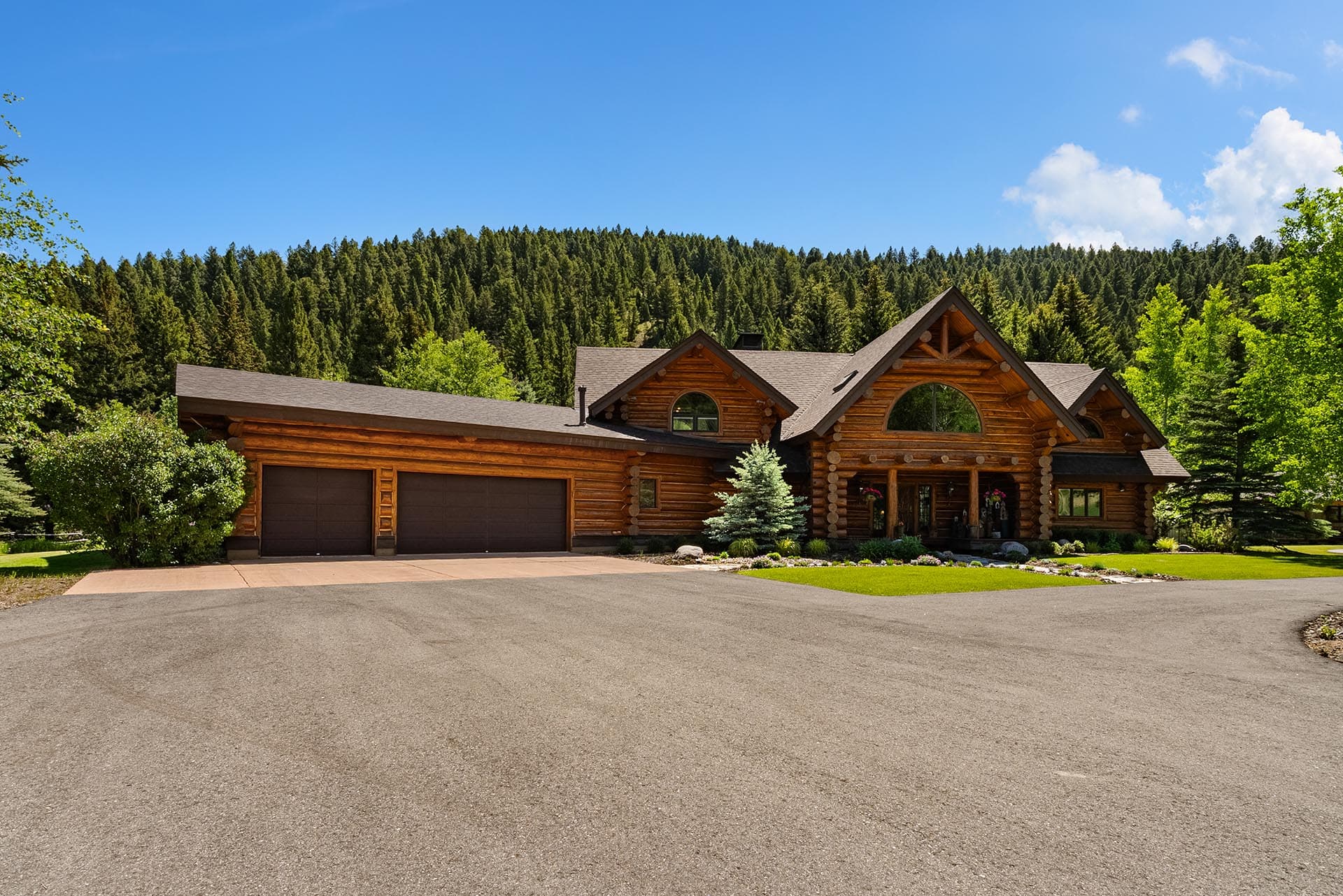 log house with garage and forest views montana gallatin riverfront retreat in big sky