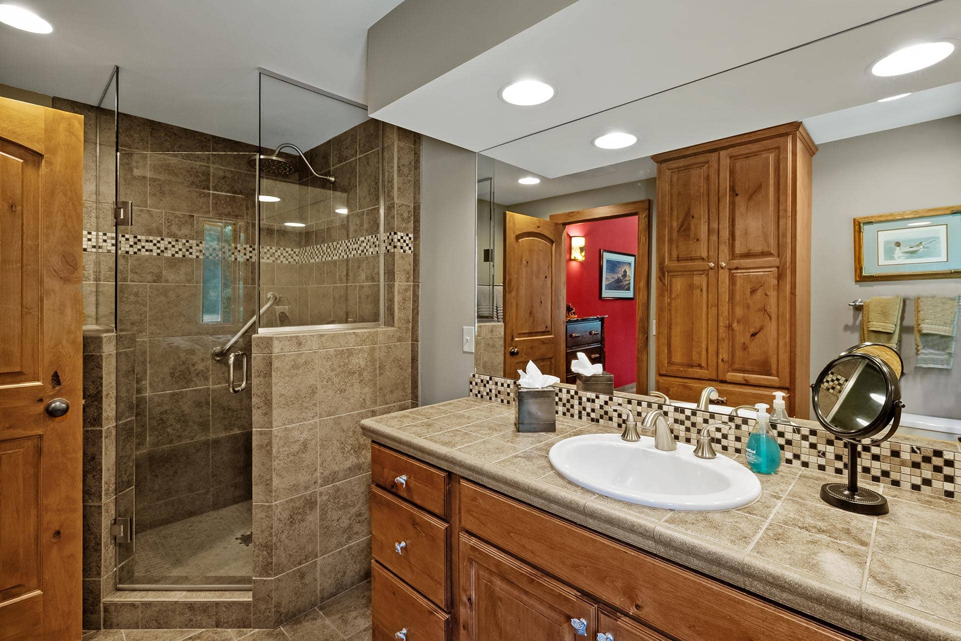 luxury home bathroom with tiled shower montana gallatin riverfront retreat in big sky