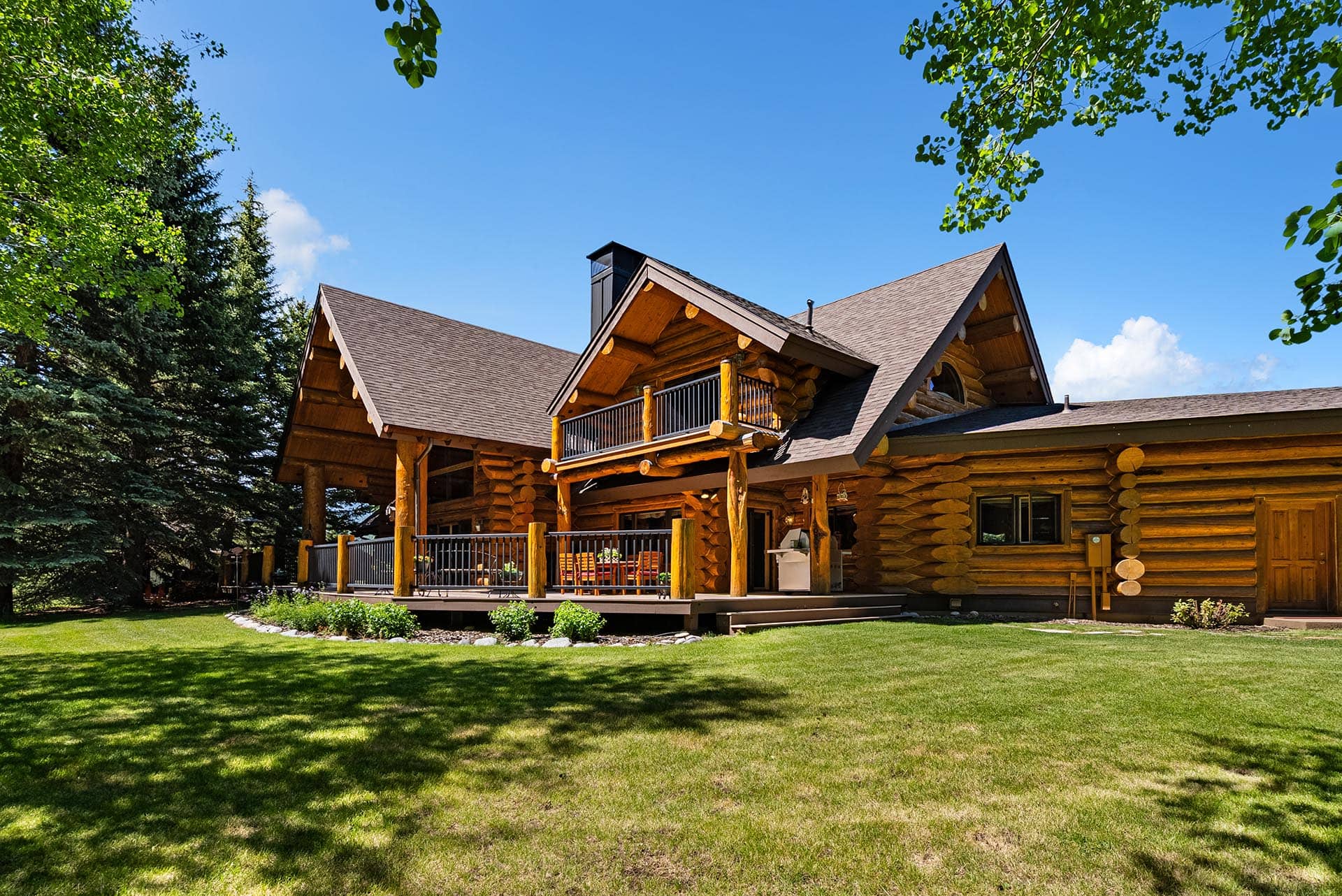 luxury log home exterior montana gallatin riverfront retreat in big sky