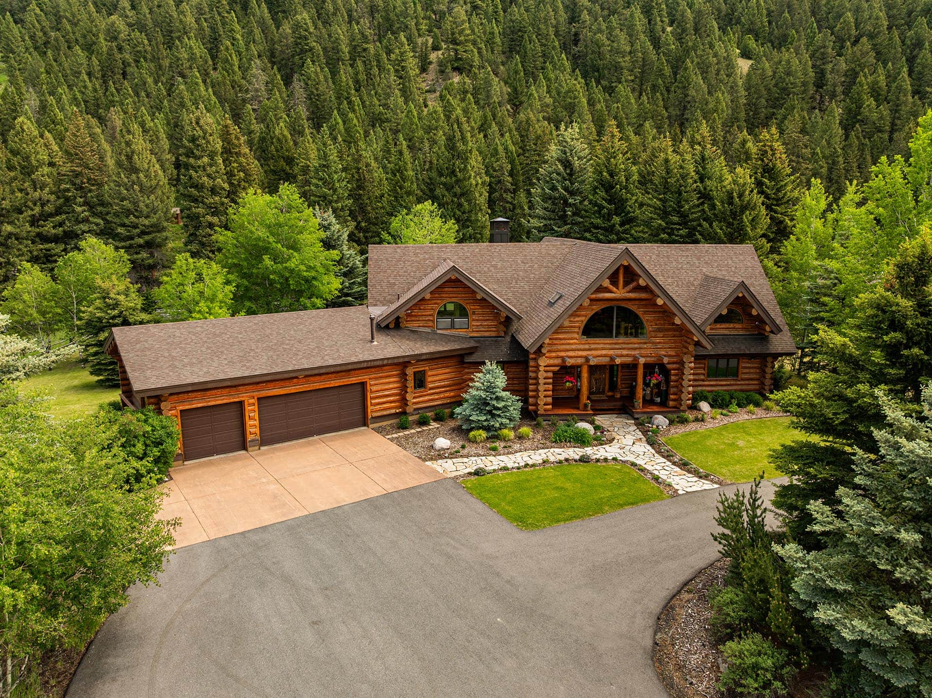 log house with garage and forest views montana gallatin riverfront retreat in big sky