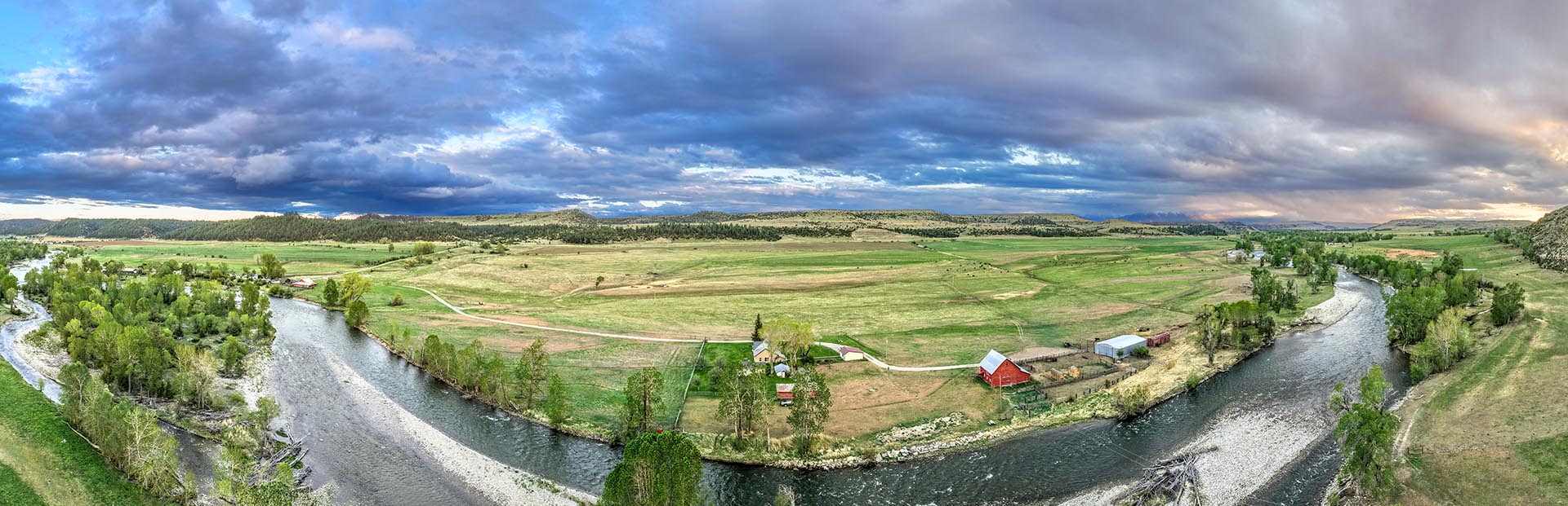 panoramic riverfront property with farm buildings montana stillwater riffle ranch