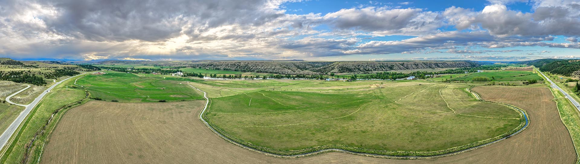 panomaric view of river valley and farm fields for sale montana stillwater riffle ranch