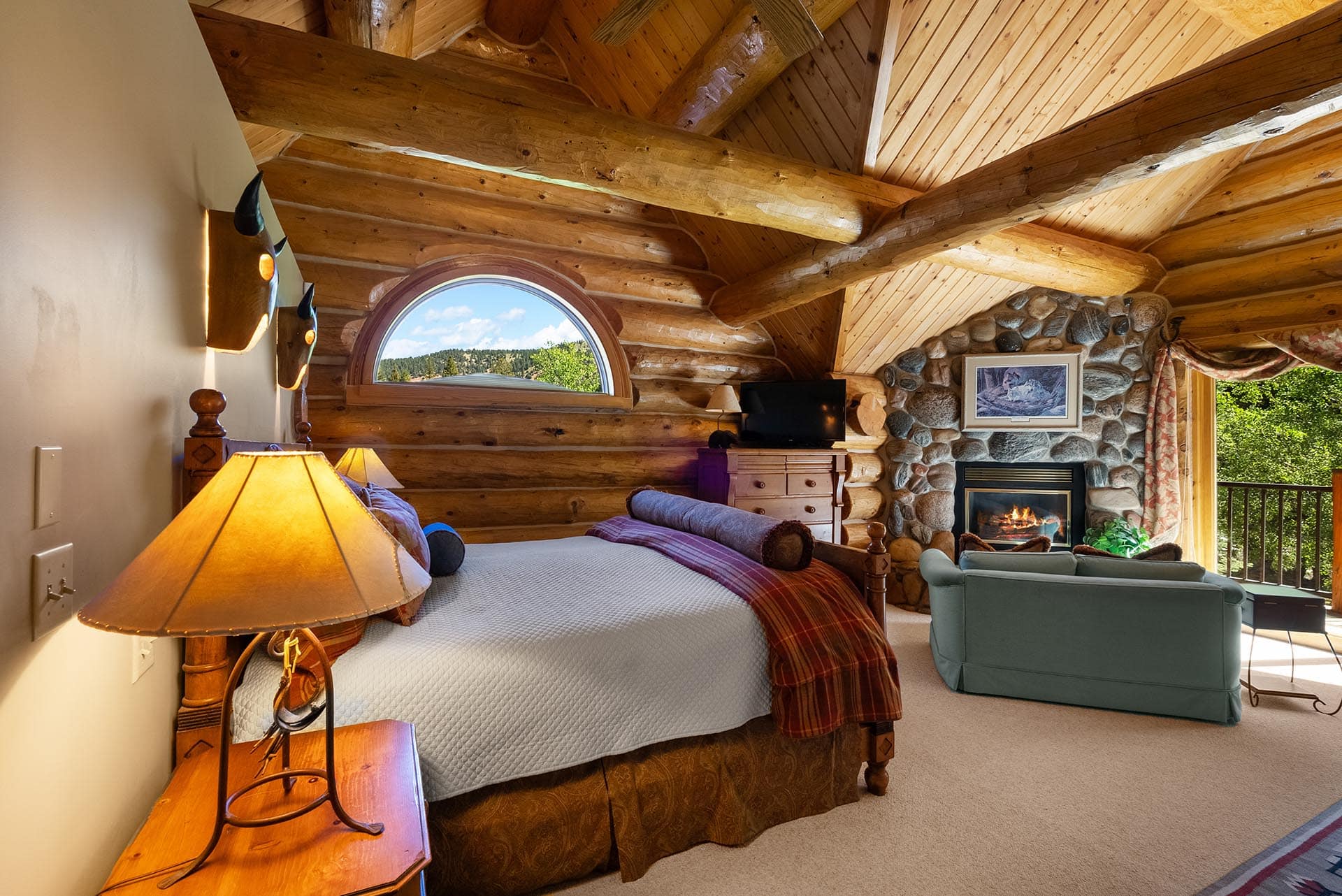 primary suite montana gallarin riverfront retreat in big sky