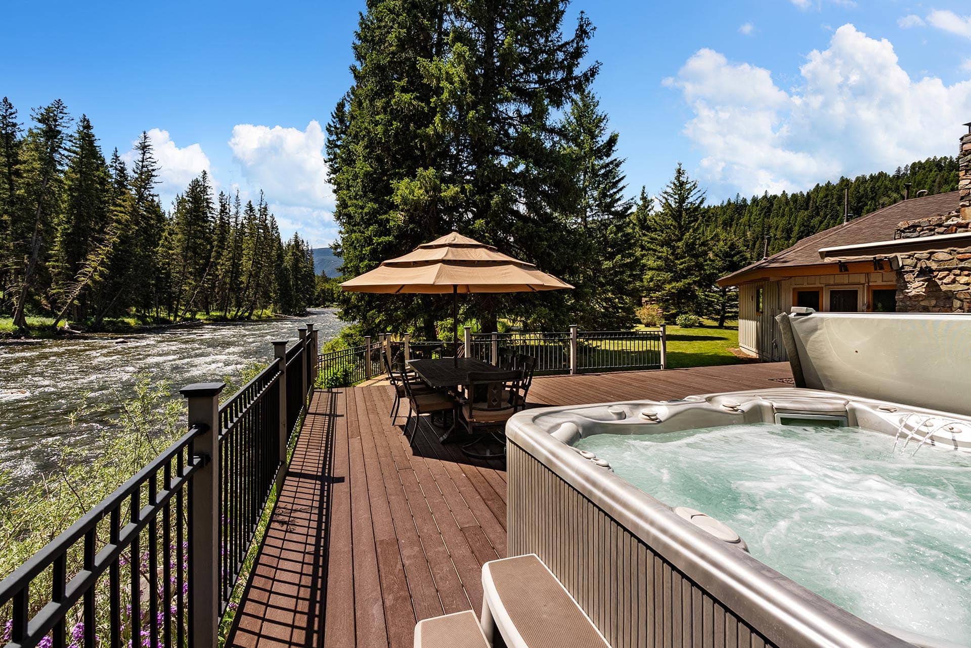 riverfront deck with hot tub property for sale montana gallatin riverfront retreat in big sky