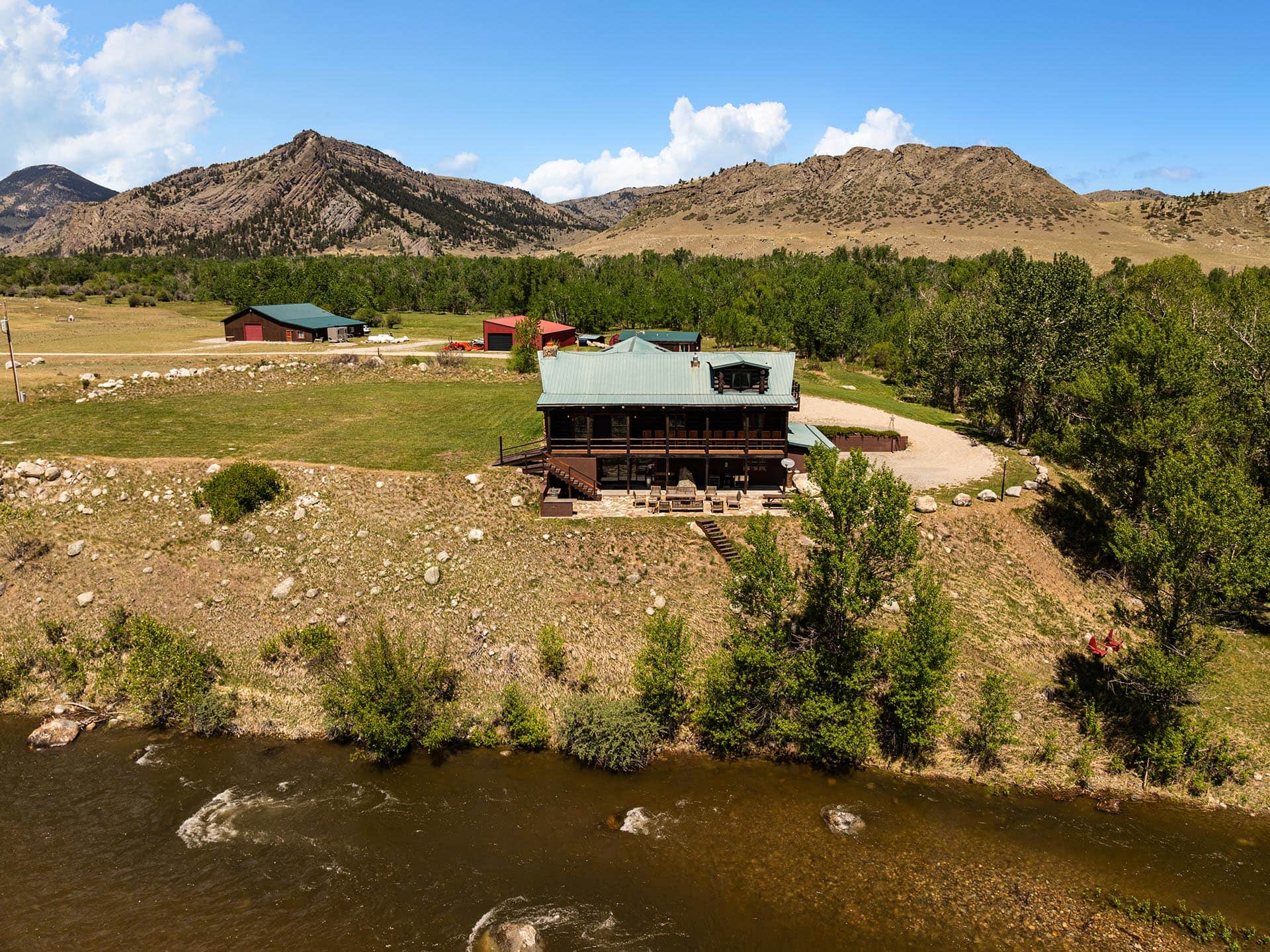 riverfront lodge with outbuildings montana two rivers lodge