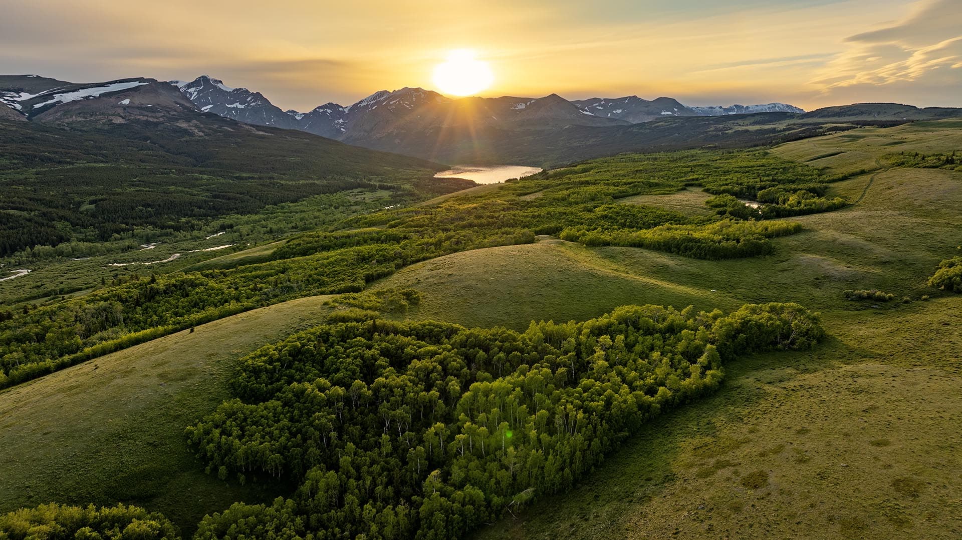 rolling hills with mountain view land montana two medicine legacy ranch