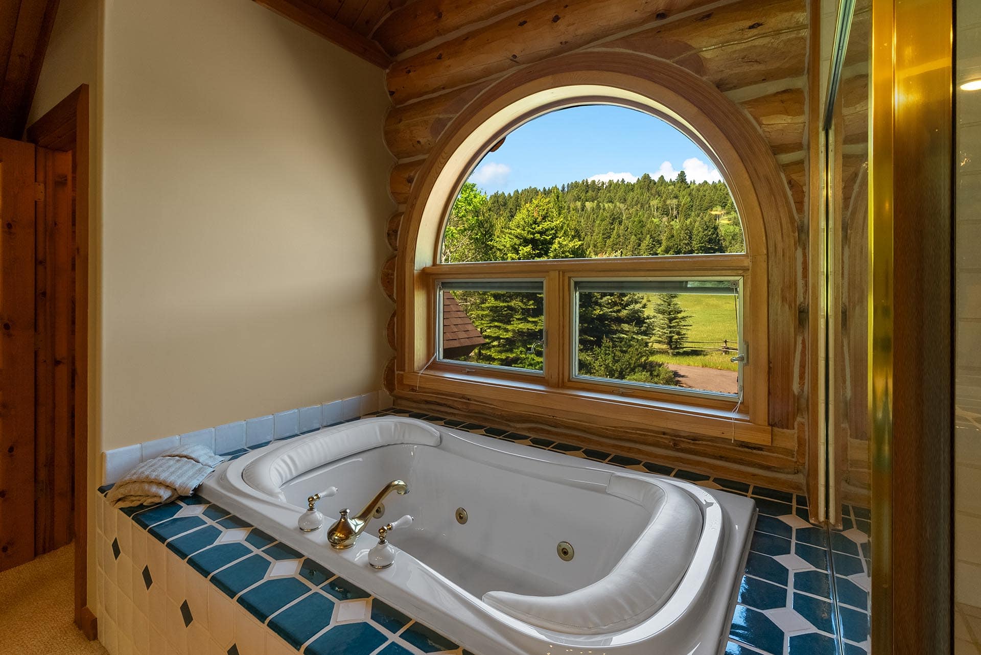 rustic bath with view montana gallatin riverfront retreat in big sky