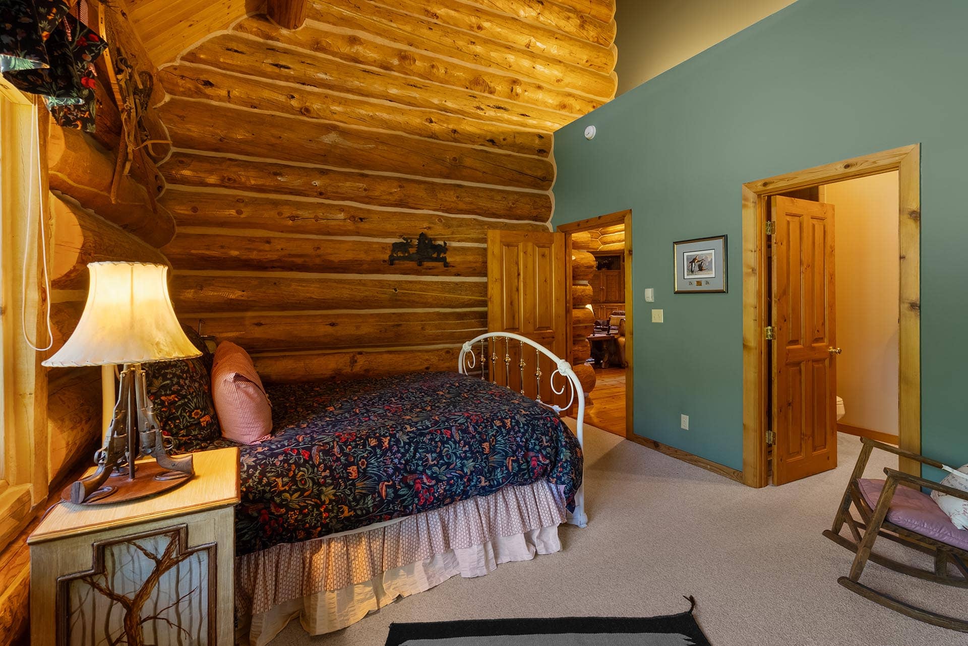 rustic bathroom with log walls montana gallatin riverfront retreat in big sky
