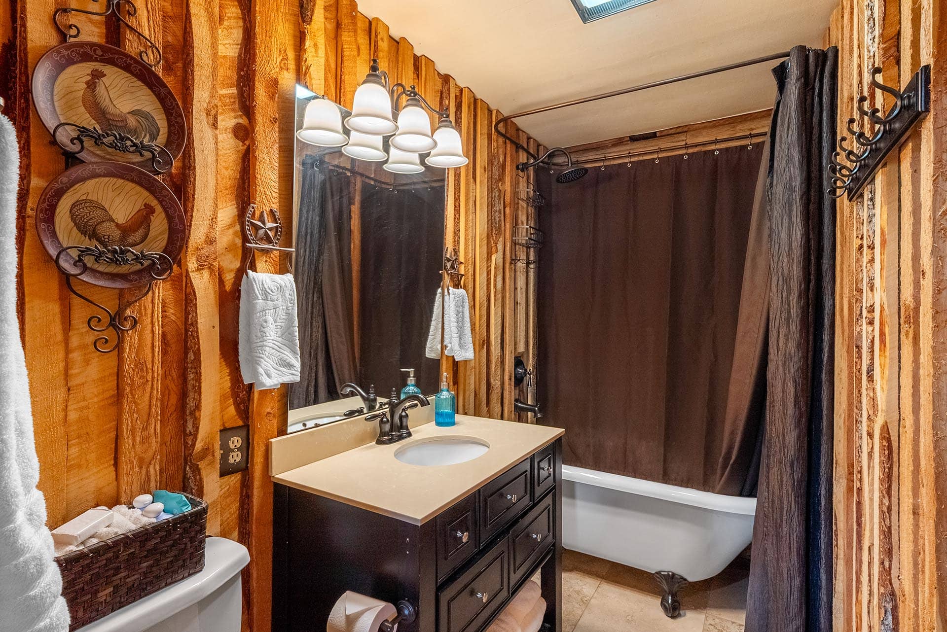 rustic log home bathroom with clawfoot tub for sale montana two rivers lodge