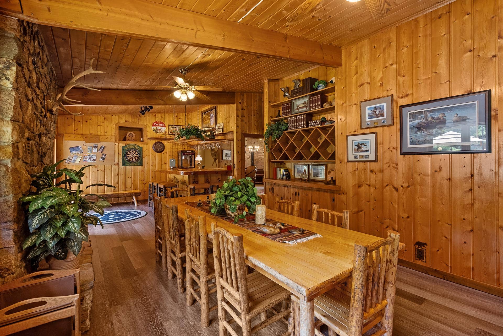 rustic wood interior dining and game area montana gallatin riverfront retreat in big sky