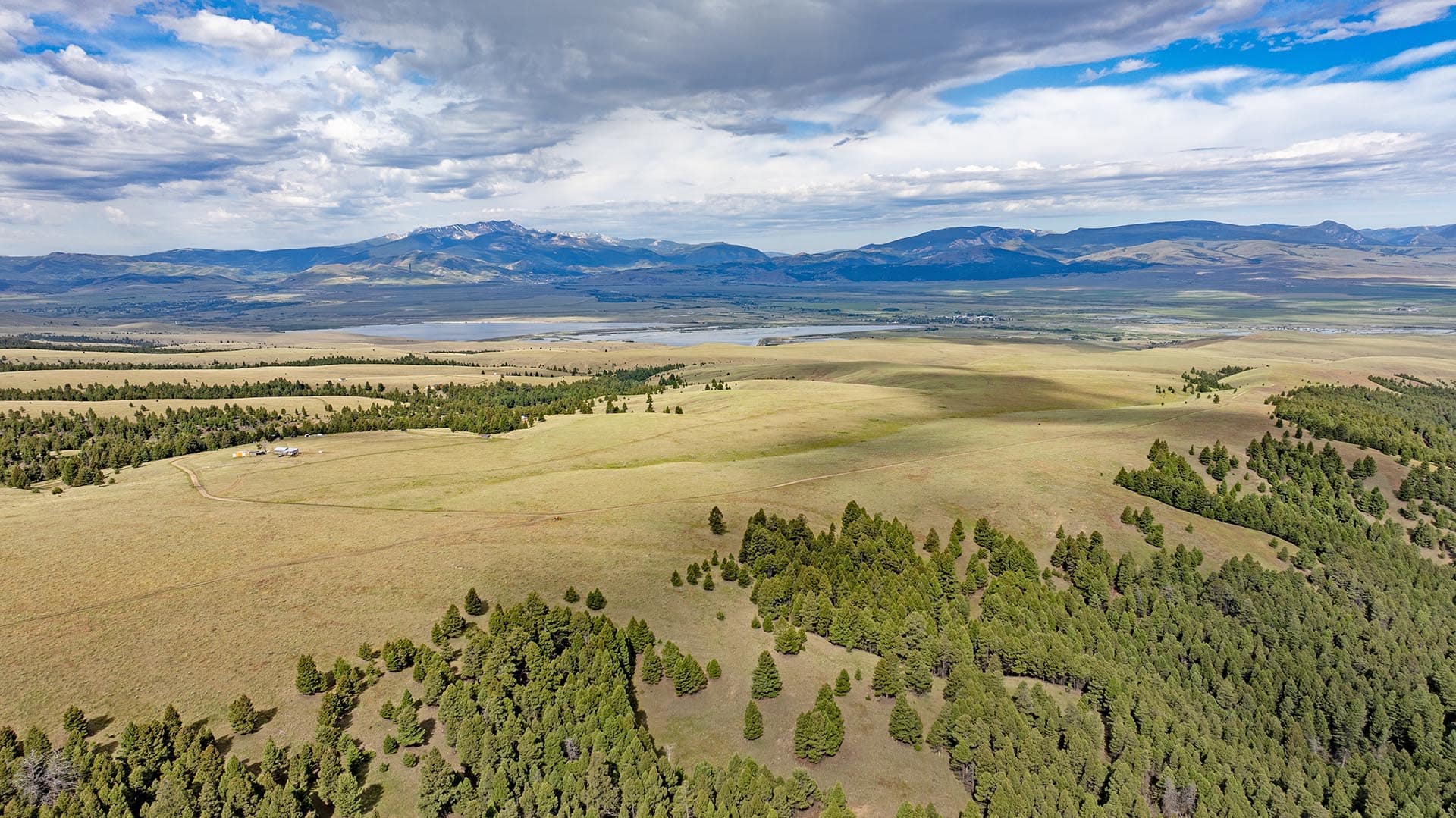 expansive mountain and lake view land for sale montana spotted dog retreat