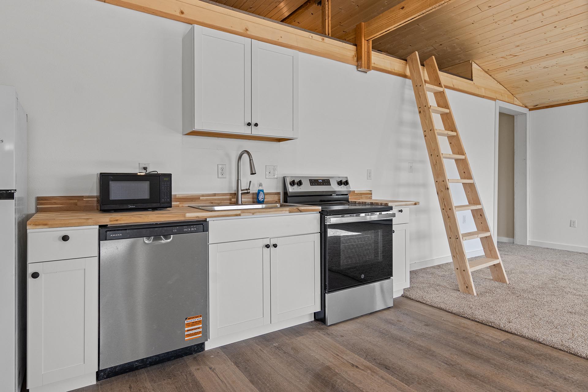 kitchen with loft access ladder montana pintler views retreat
