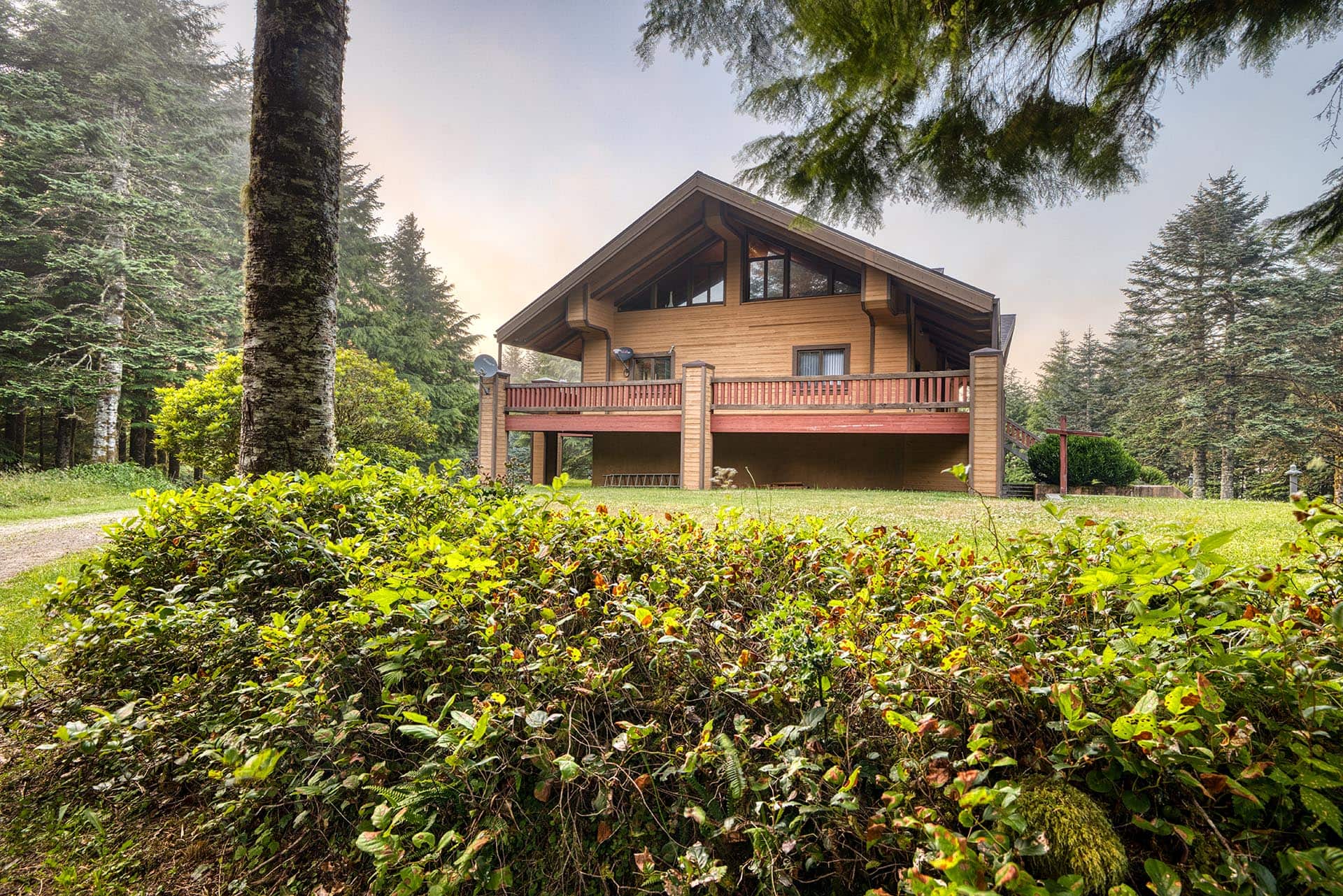 second house east exterior oregon tillamook bay timber retreat