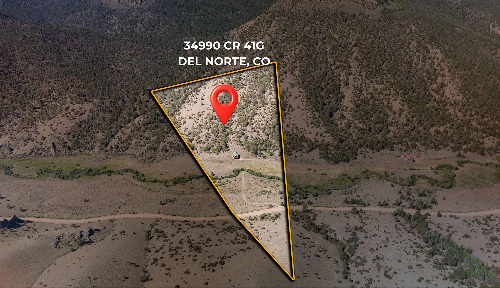 Aerial view of an orange-outlined triangular property with a red location pin over 34990 CR 41G, Del Norte, CO, on a hillside.