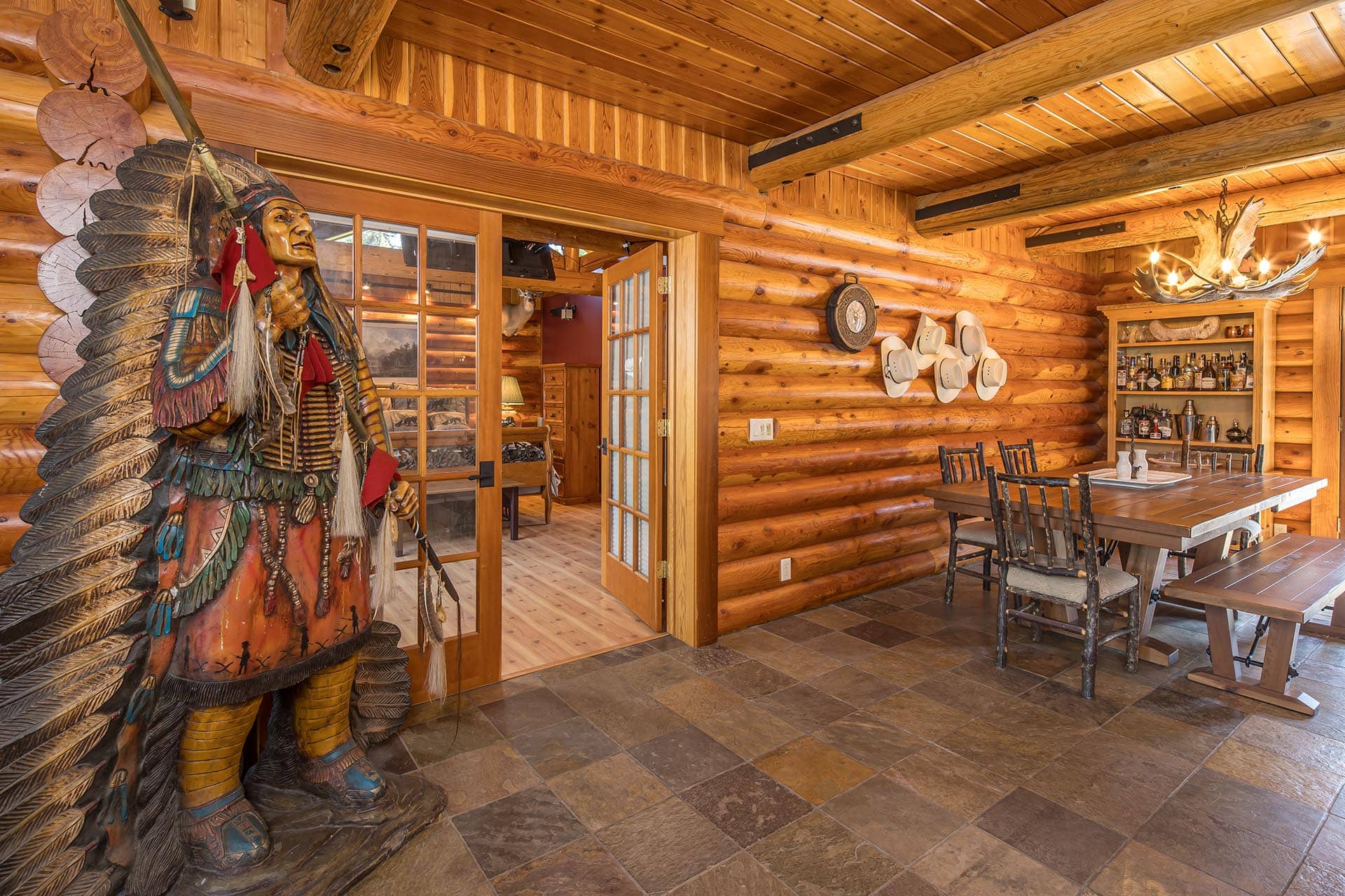 luxury log cabin dining area montana elk ranch