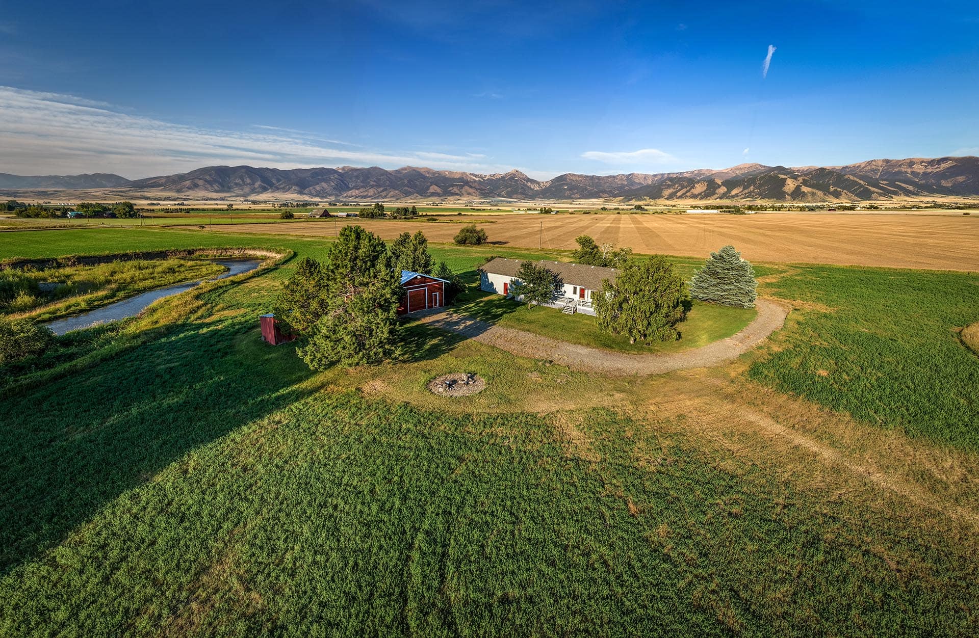 rural home with barn and fields for sale montana east gallatin riverlands