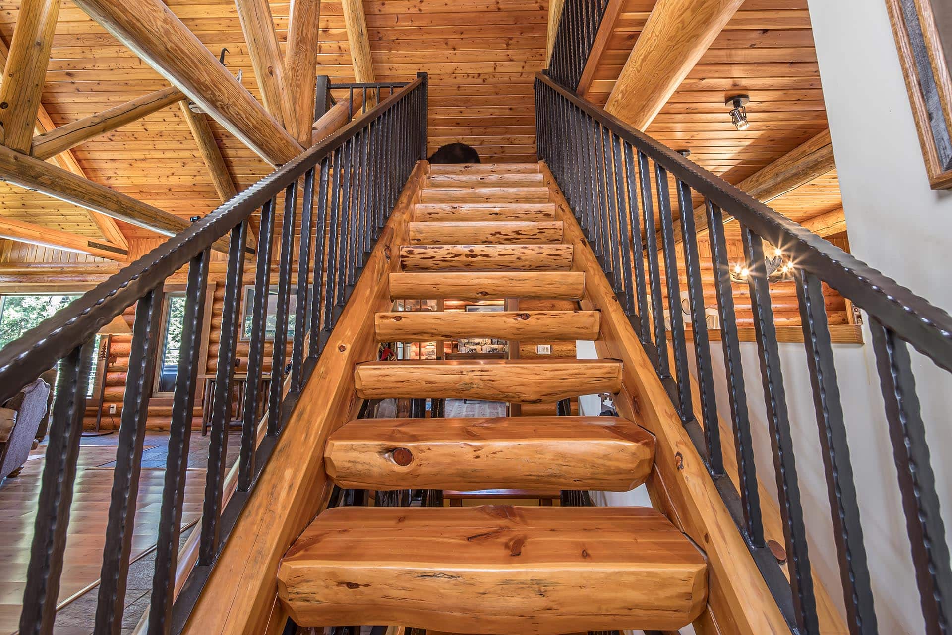 rustic wood staircase property montana elk ranch