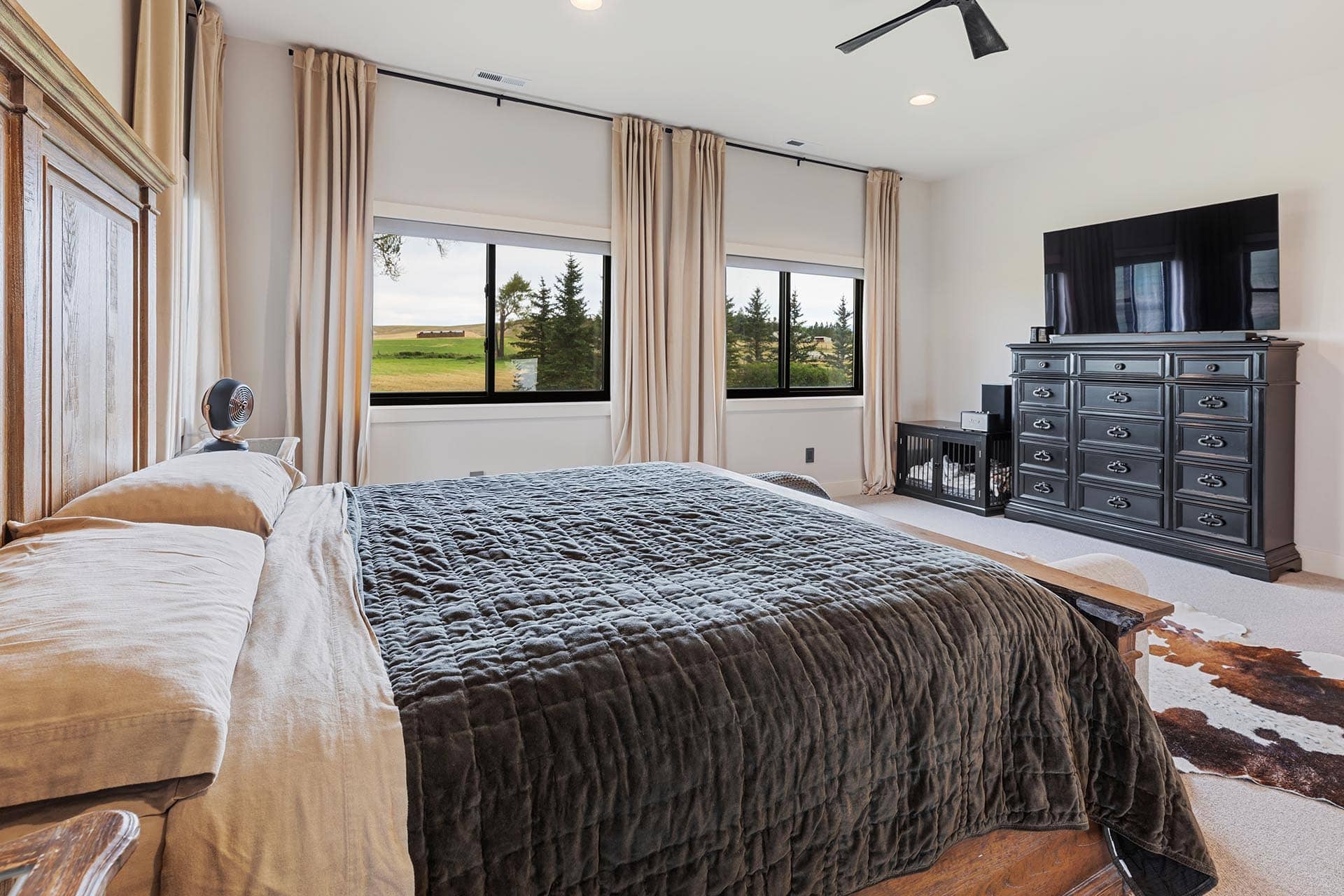 spacious bedroom with field views montana hollowtop homestead