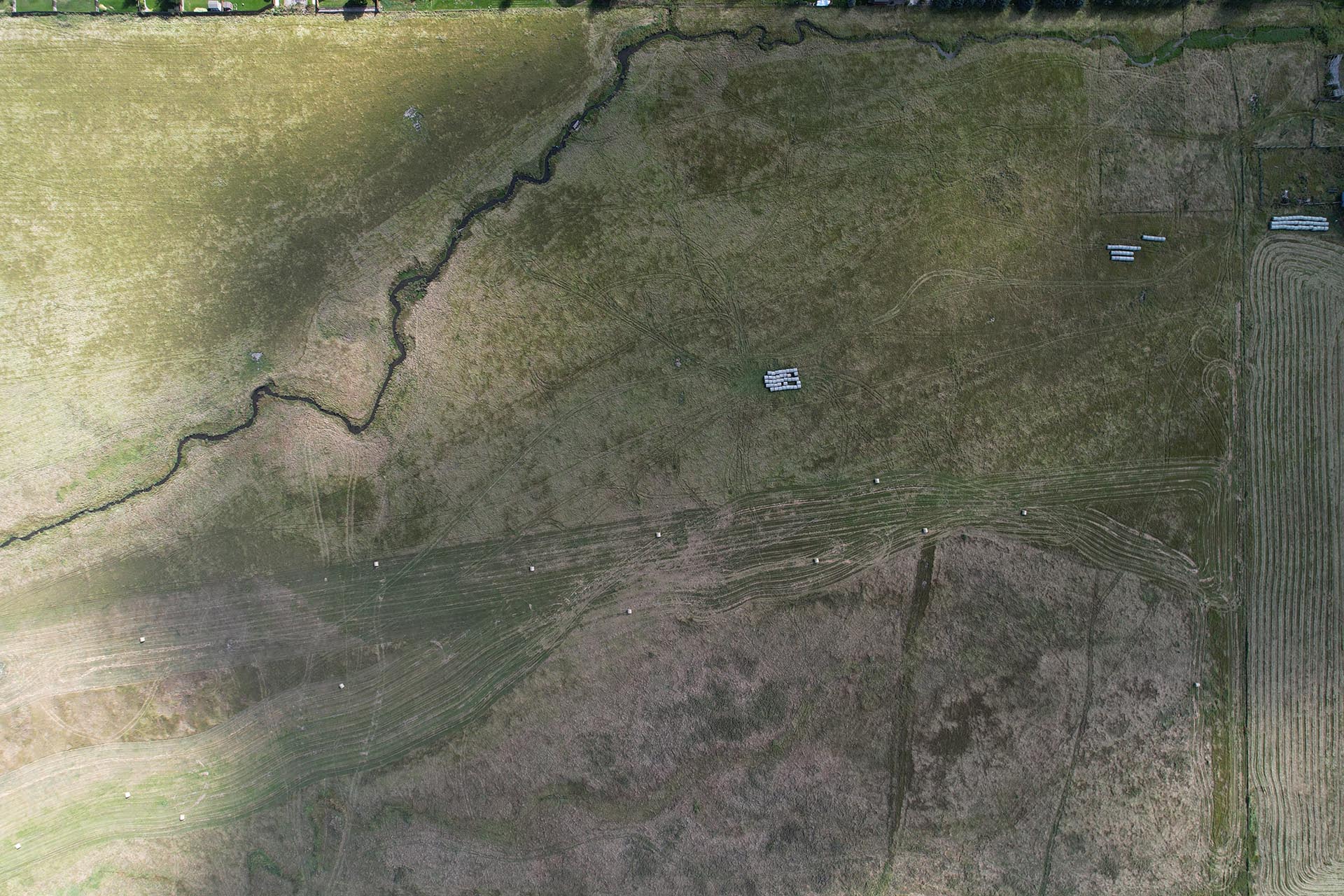 aerial view farm land with creek montana west bozeman homestead
