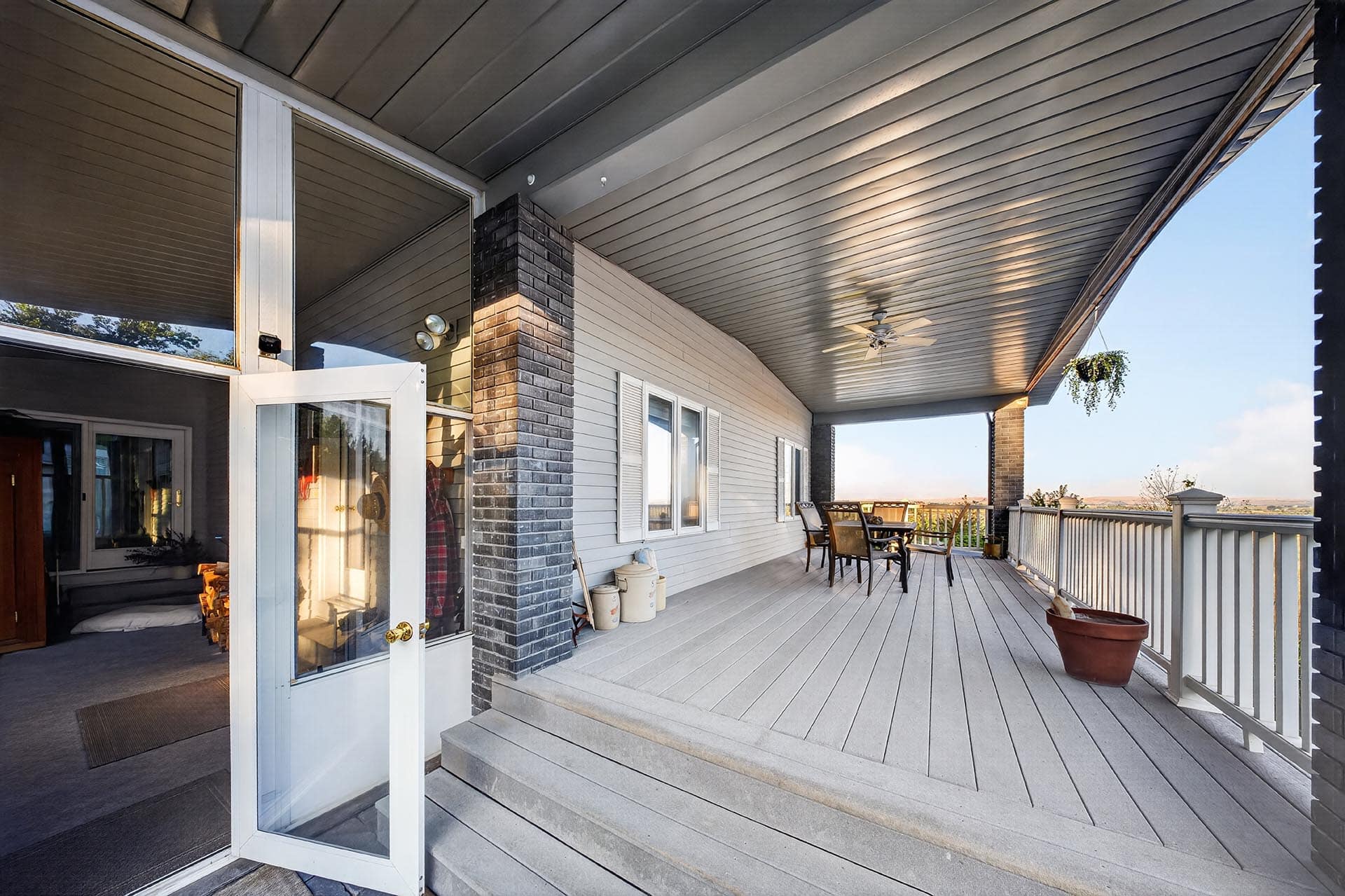 covered deck with outdoor dining and view idaho apple ridge farmstead