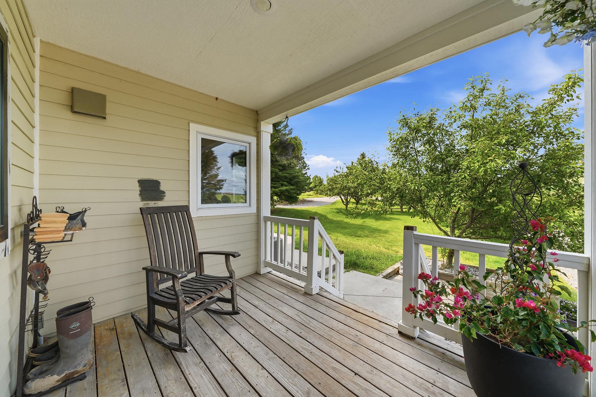 covered front porch with rocking chair montana trailcrest horse property
