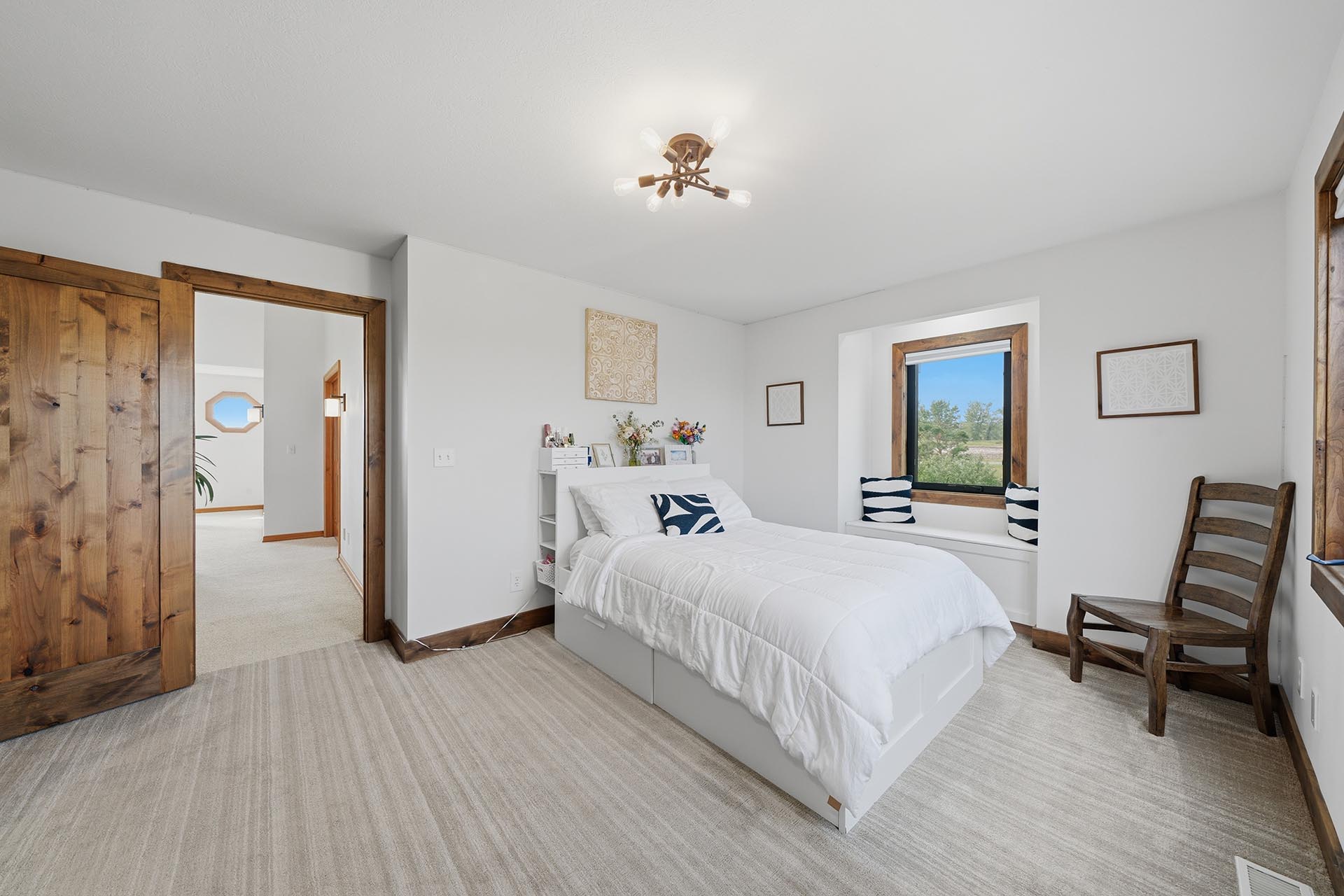 cozy guest bedroom with window seat montana trailcrest horse property