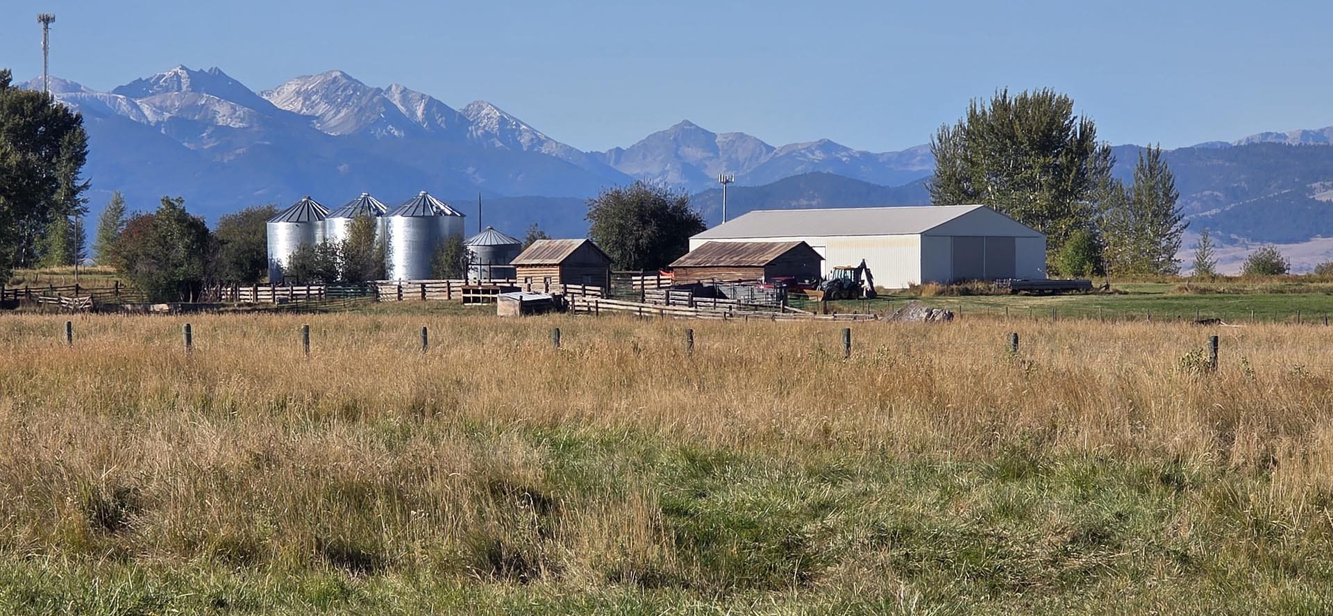 farm buildings and silos land with mountain views montana west bozeman homestead