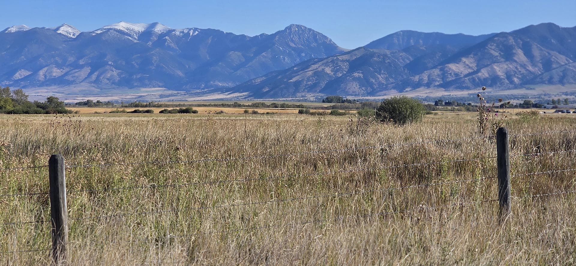 fenced pasture land with mountain views montana west bozeman homestead