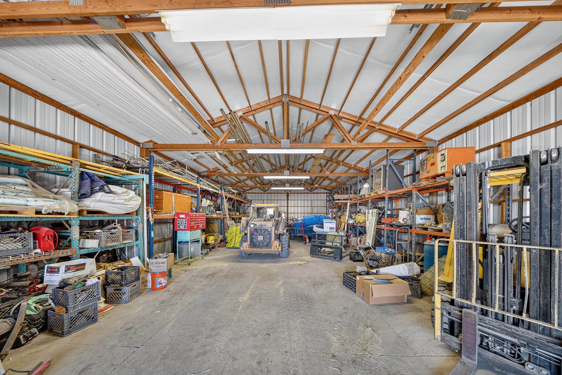 interior shop storage with skid steer idaho apple ridge farmstead