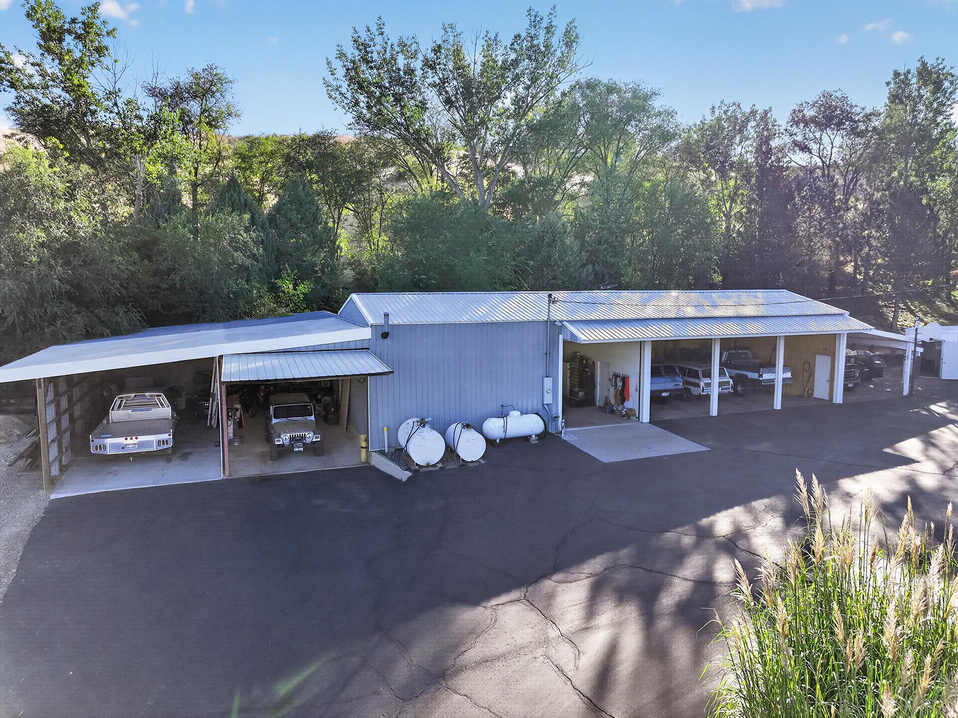 large equipment shop with covered parking idaho apple ridge farmstead