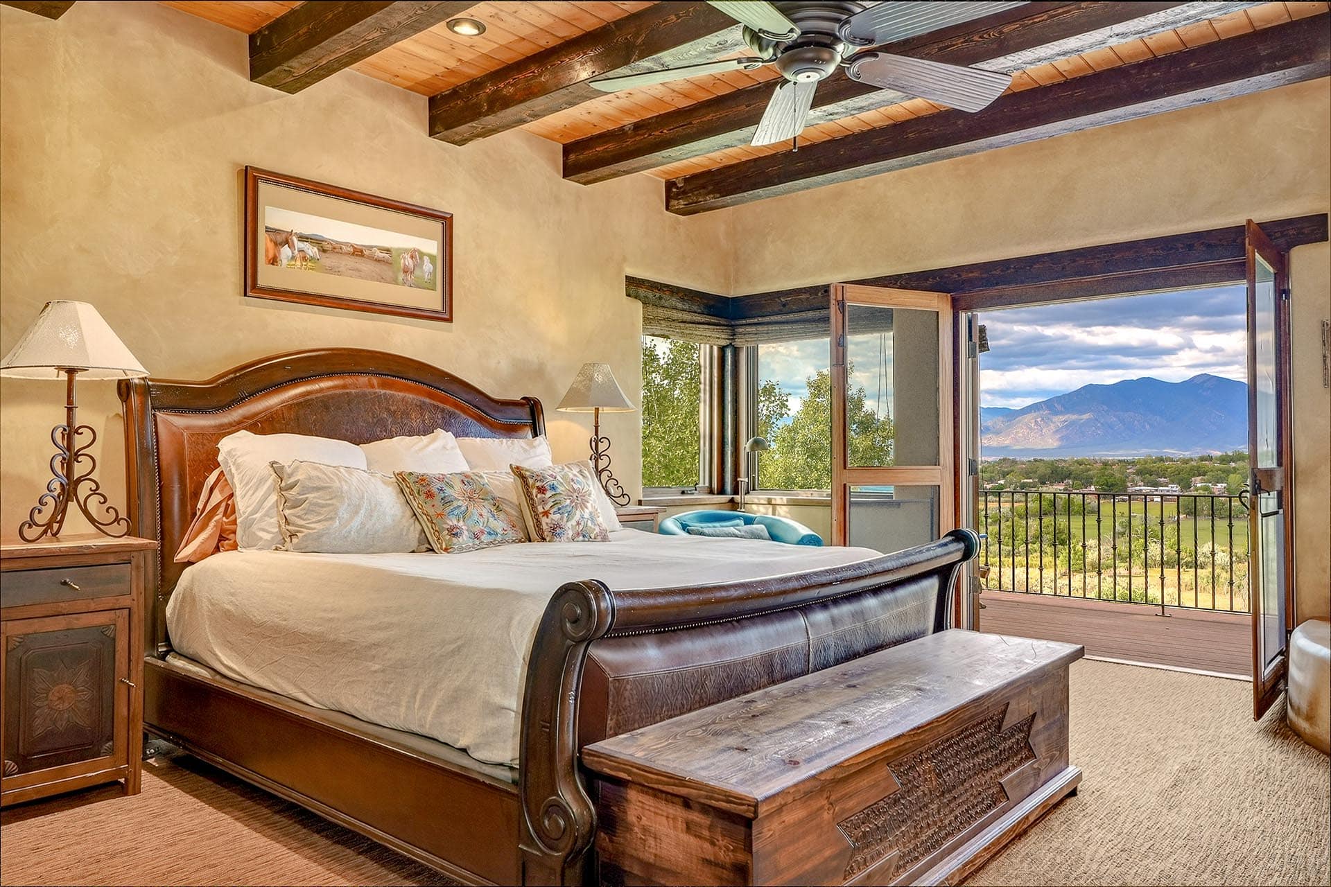 luxury bedroom with mountain view balcony new mexico hacienda de suenos