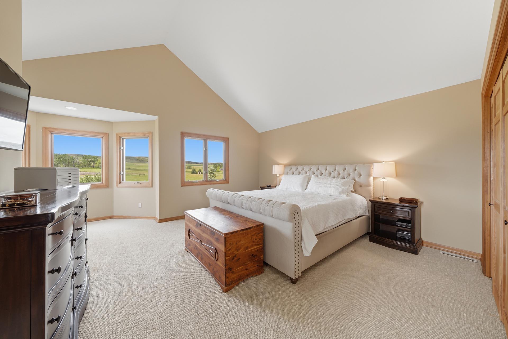 luxury master bedroom with scenic views montana trailcrest horse property