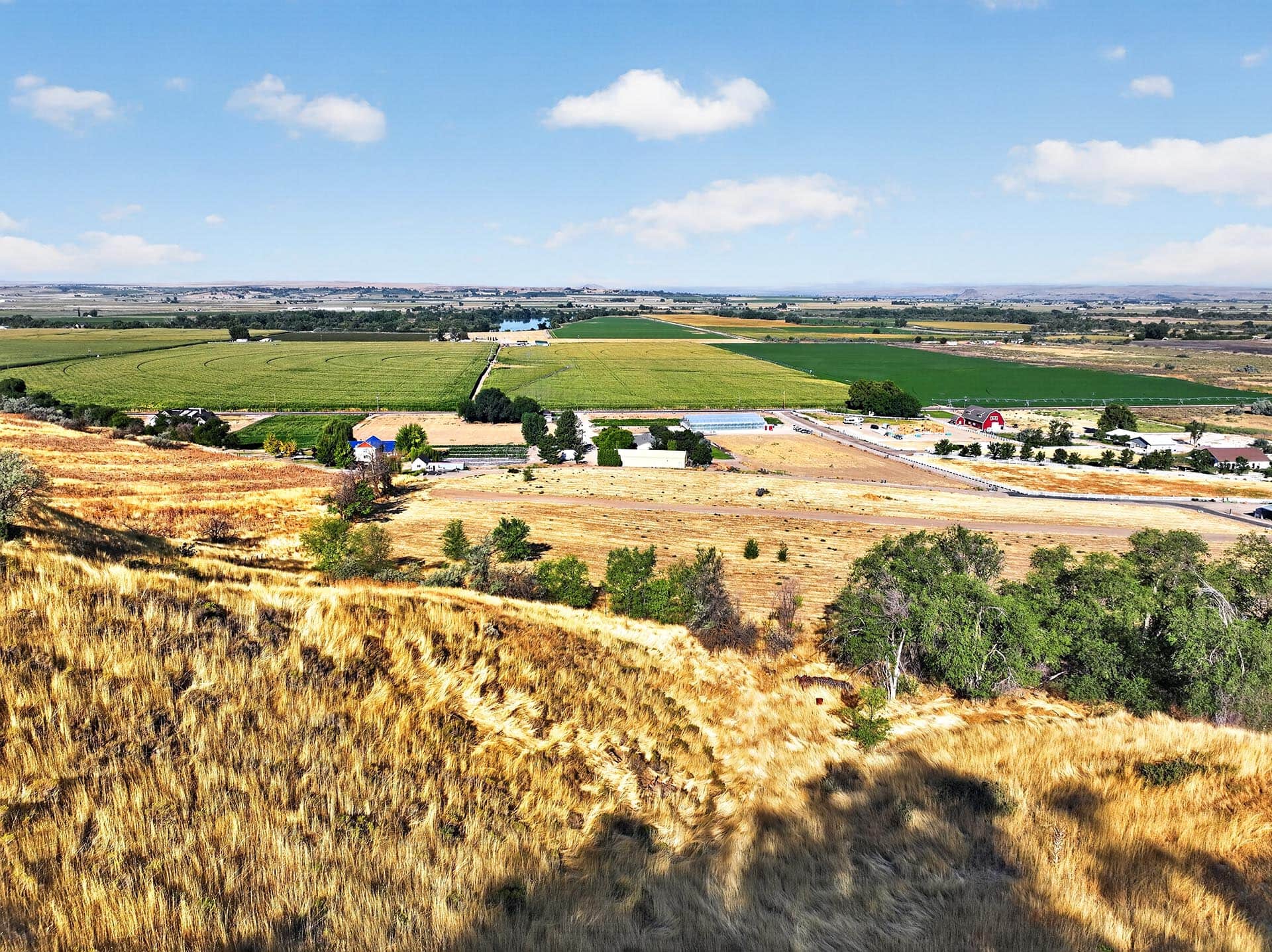 panoramic view irrigated farmland and river valley idaho apple ridge farmstead