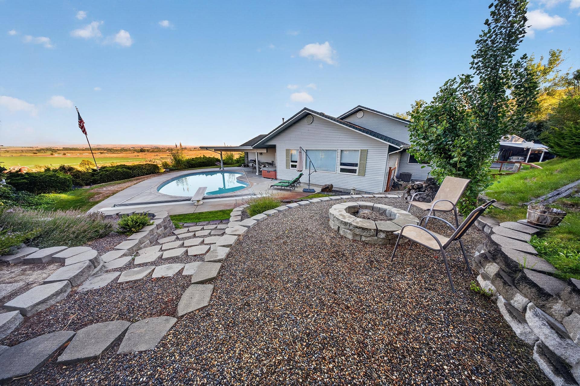 pool and fire pit patio with valley view idaho apple ridge farmstead