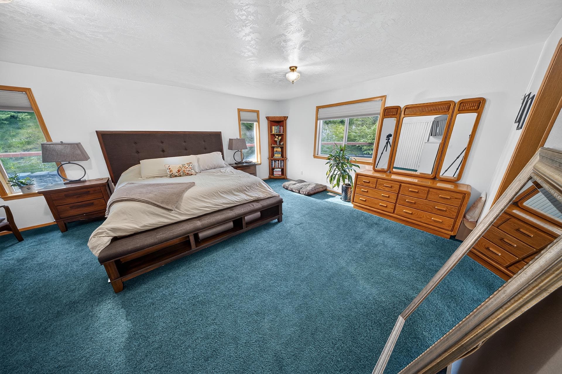 primary bedroom with dresser and mirror idaho apple ridge farmstead