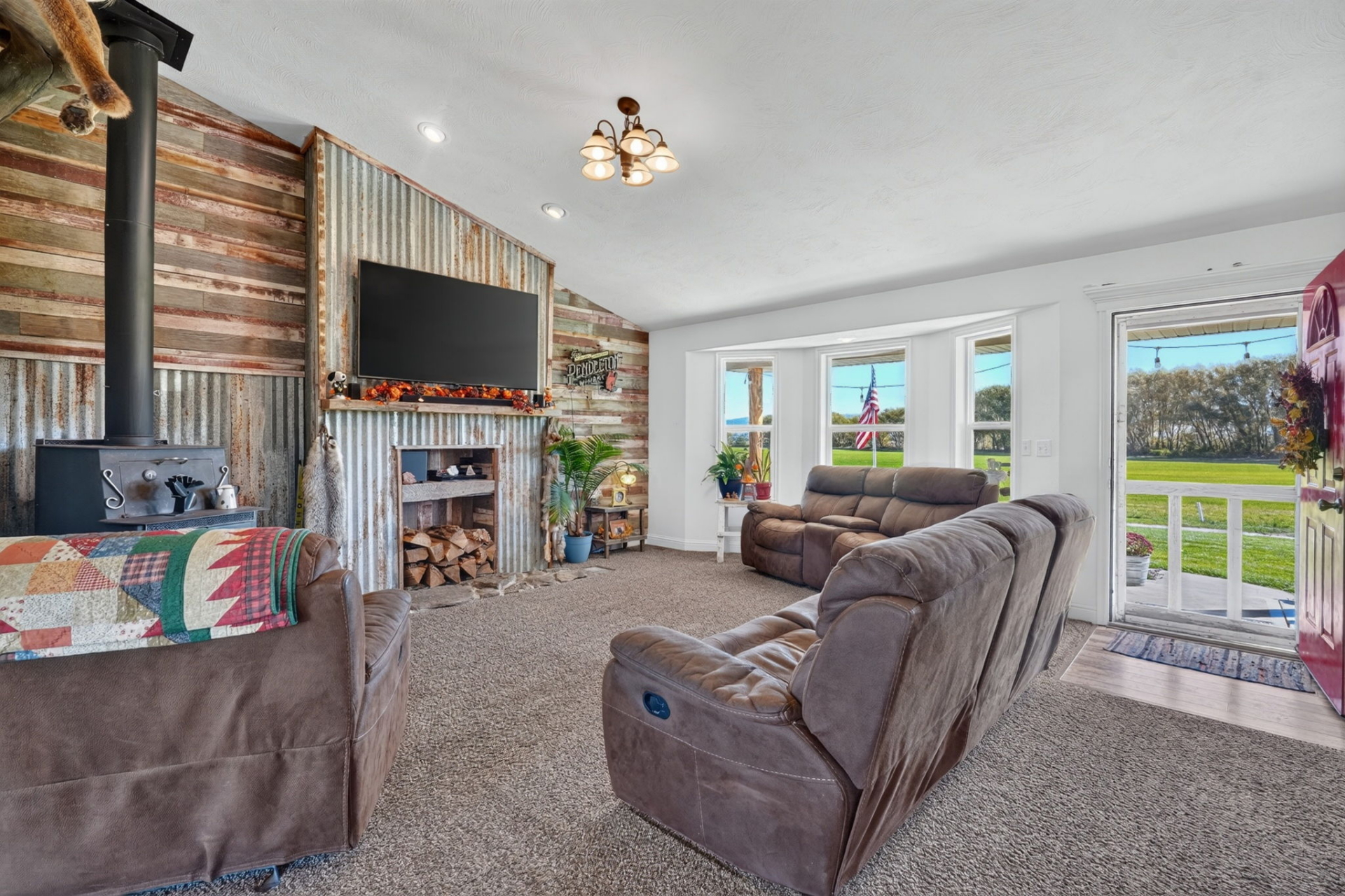 Farmhouse Living Room with Fireplace Idaho Sand Creek Farmstead